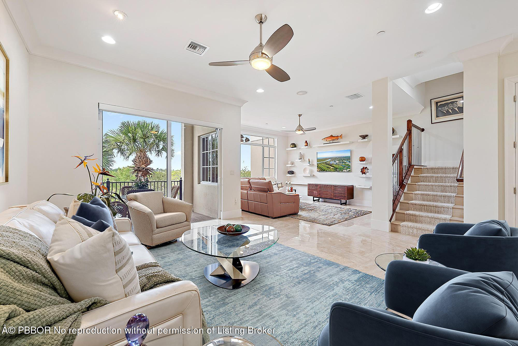 138 Tierra Lane, Unit 6 Jupiter, FL 33477 - Photo 5 of 41 a living room with furniture and a large window