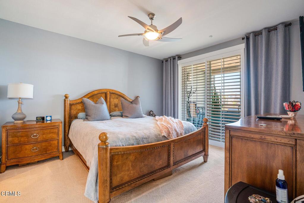 1541 Windshore Way Oxnard, CA 93035 - Photo 21 of 42 a bedroom with a bed a window and dresser