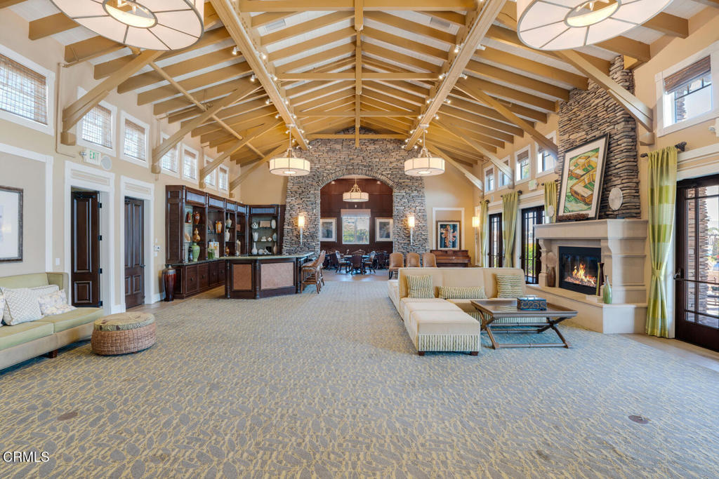 1541 Windshore Way Oxnard, CA 93035 - Photo 41 of 42 a living room with furniture and a chandelier