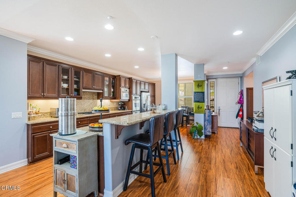 1541 Windshore Way Oxnard, CA 93035 - Photo 7 of 42 a view of a kitchen and dining room