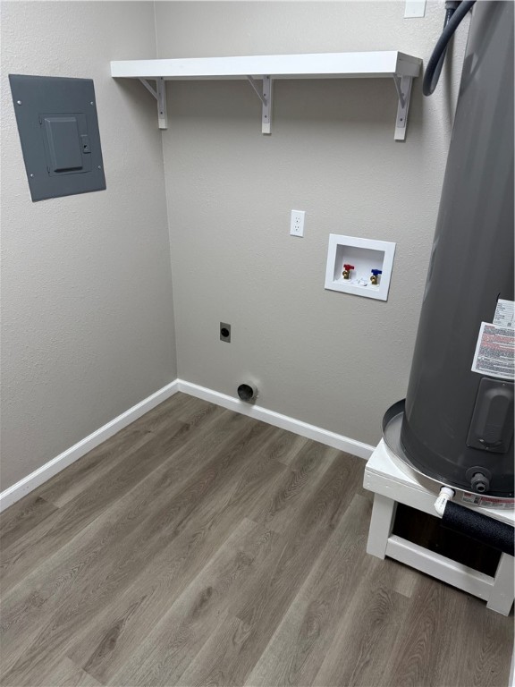 512 Wheeler Street Three Rivers, TX 78071 - Photo 11 of 19 a room with a wooden floor and shoes