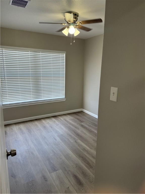512 Wheeler Street Three Rivers, TX 78071 - Photo 5 of 19 a view of an empty room with a window