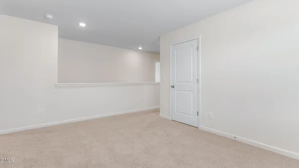 an empty room with an entryway