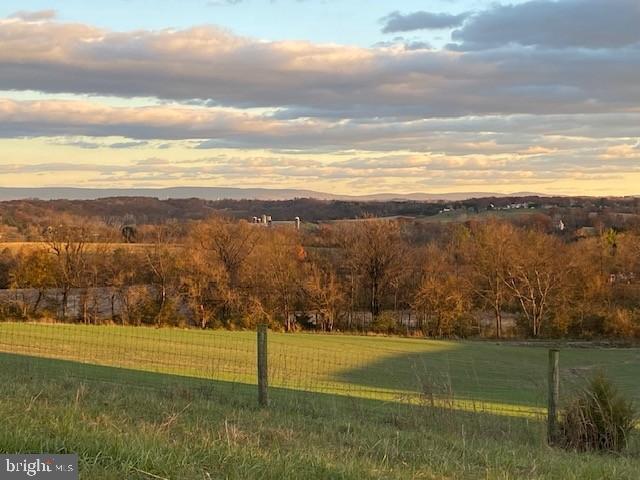 14521 Fairview Hill Lane Clear Spring, MD 21722 - Photo 4 of 9 Golden hour over rolling hills and fields.