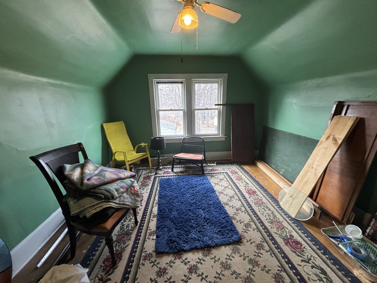 815 20th Street East Moline, IL 61244 - Photo 8 of 12 a living room with furniture and a wooden floor