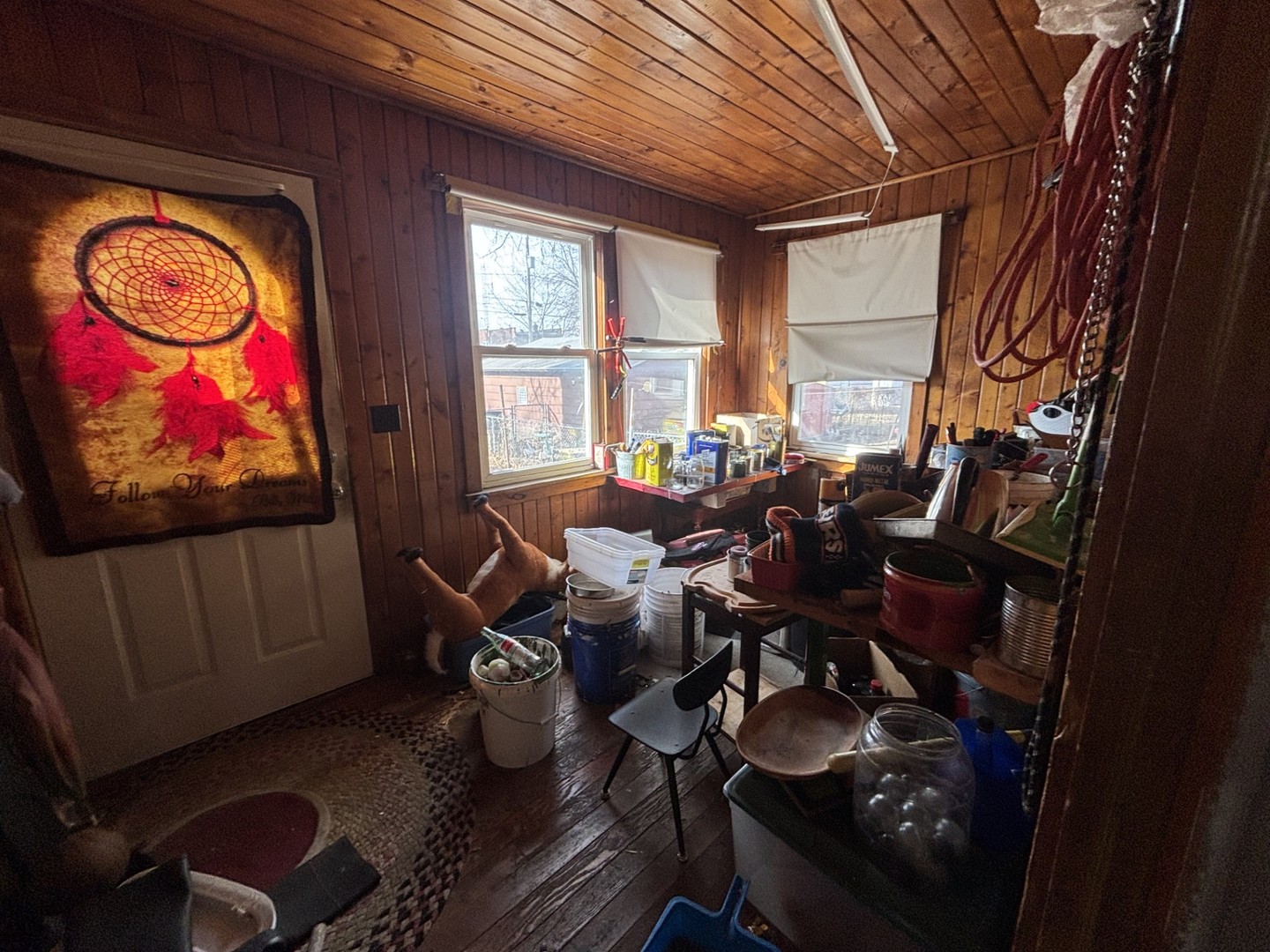 815 20th Street East Moline, IL 61244 - Photo 10 of 12 a living room with furniture a window and wooden floor