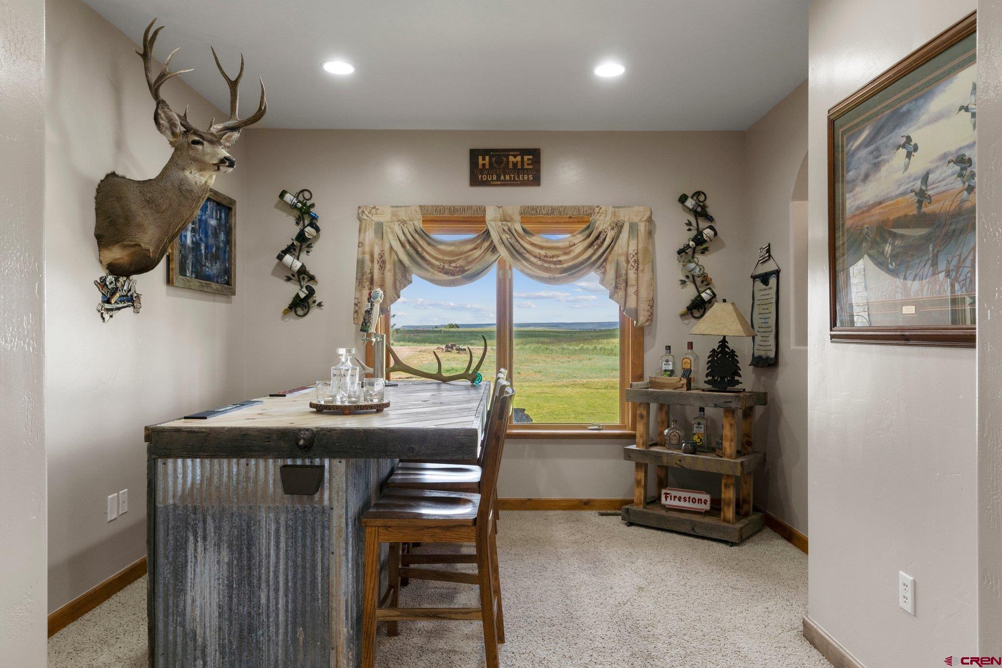 16132 Ee Road Pleasant View, CO 81331 - Photo 14 of 35 a room with gym equipment and large mirror