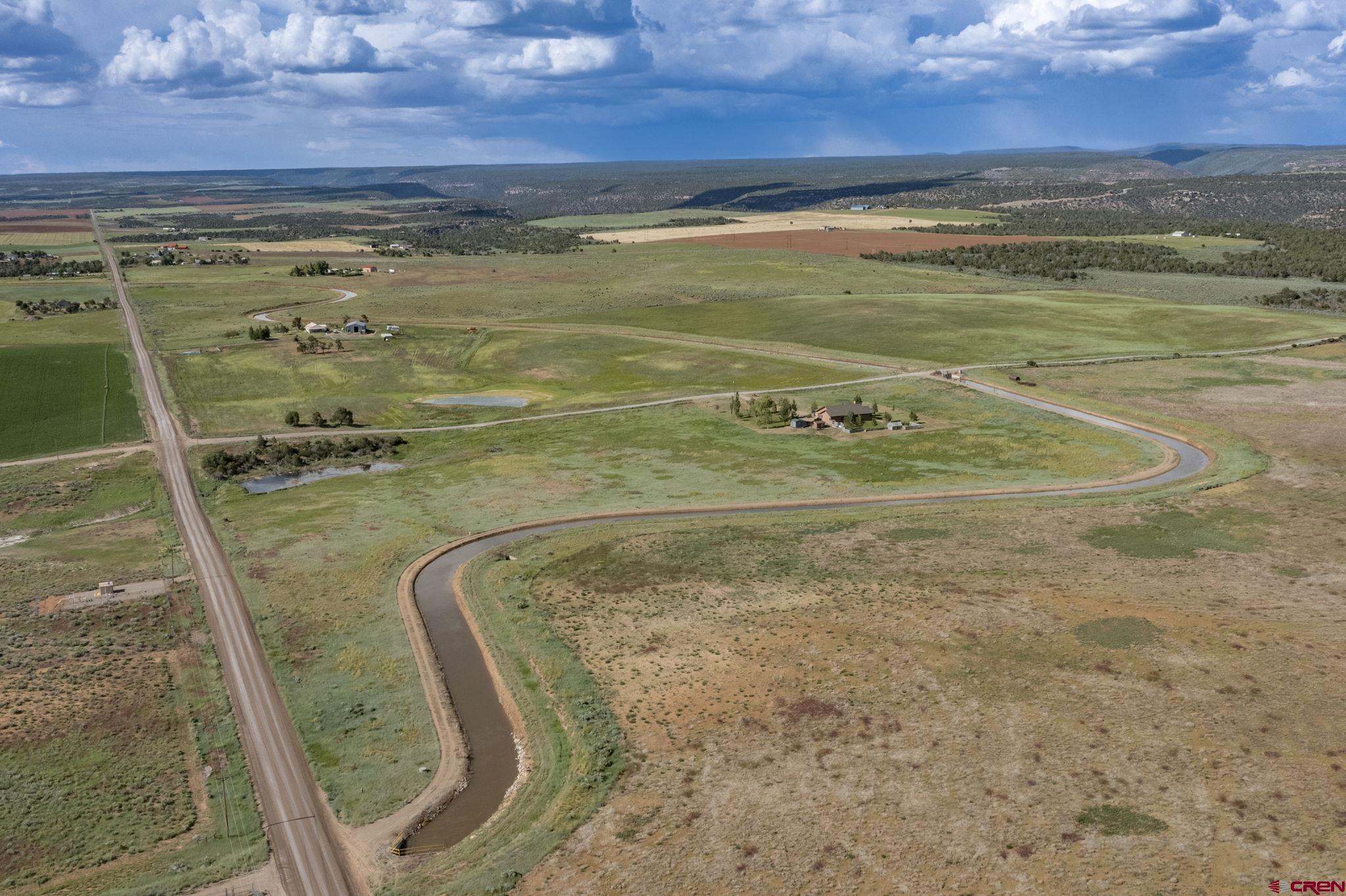 16132 Ee Road Pleasant View, CO 81331 - Photo 3 of 35 a view of a swimming pool with an ocean view