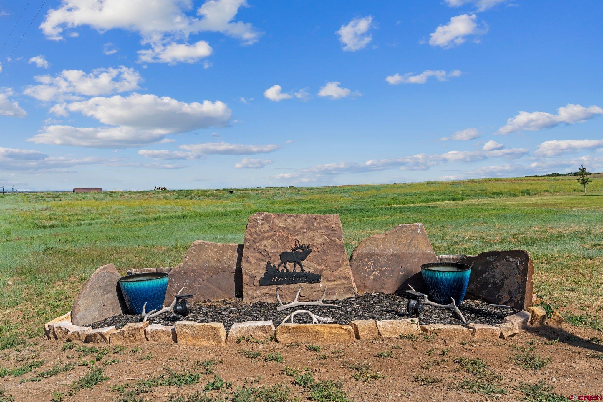 16132 Ee Road Pleasant View, CO 81331 - Photo 35 of 35 a view of a swimming pool and lounge chairs in back yard