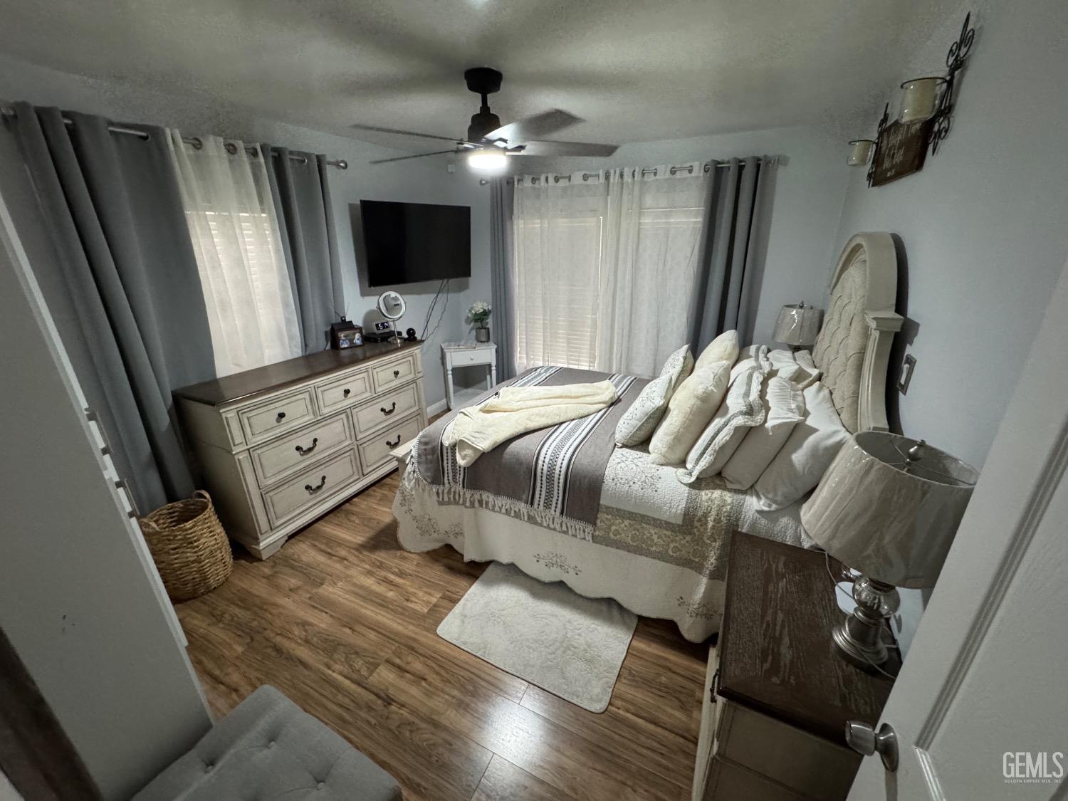 Undisclosed Address Bakersfield, CA 93304 - Photo 14 of 19 view of living room with furniture and a flat screen tv