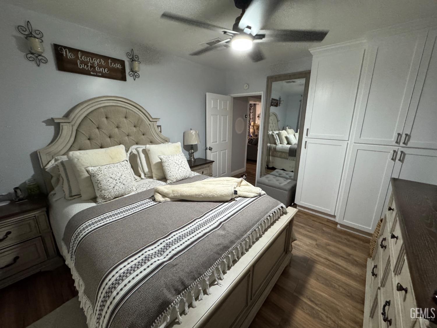 Undisclosed Address Bakersfield, CA 93304 - Photo 15 of 19 a bedroom with a bed and a flat screen tv