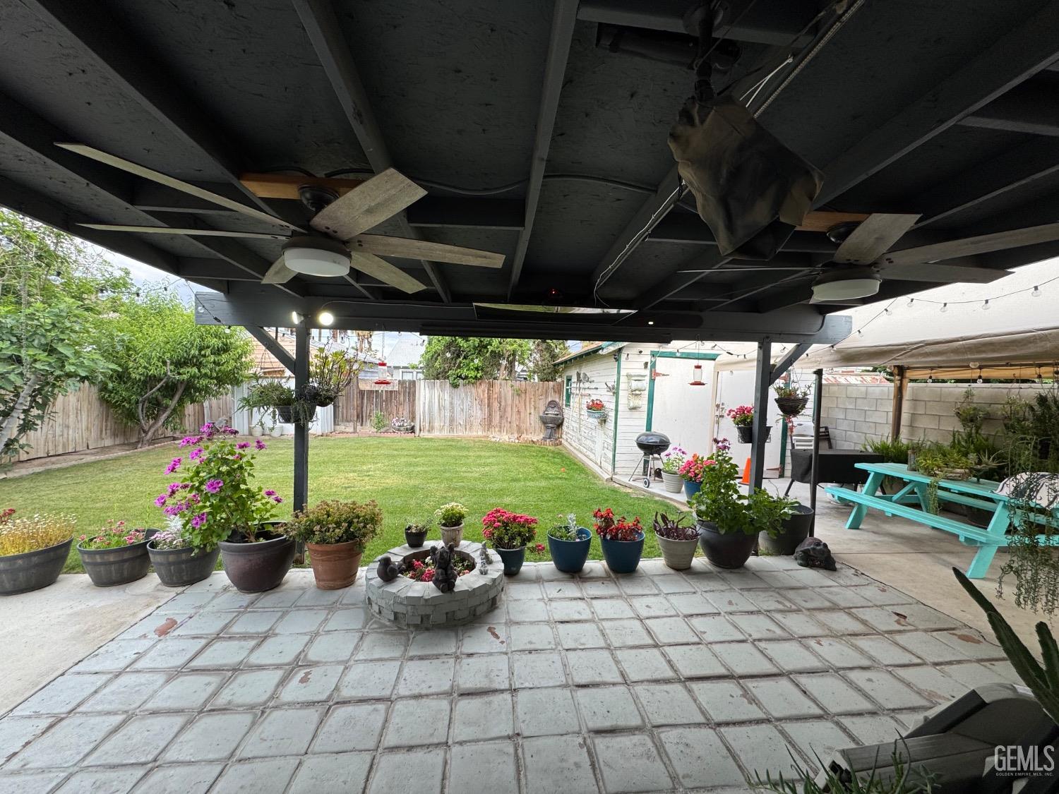 Undisclosed Address Bakersfield, CA 93304 - Photo 18 of 19 a view of a porch with furniture and garden
