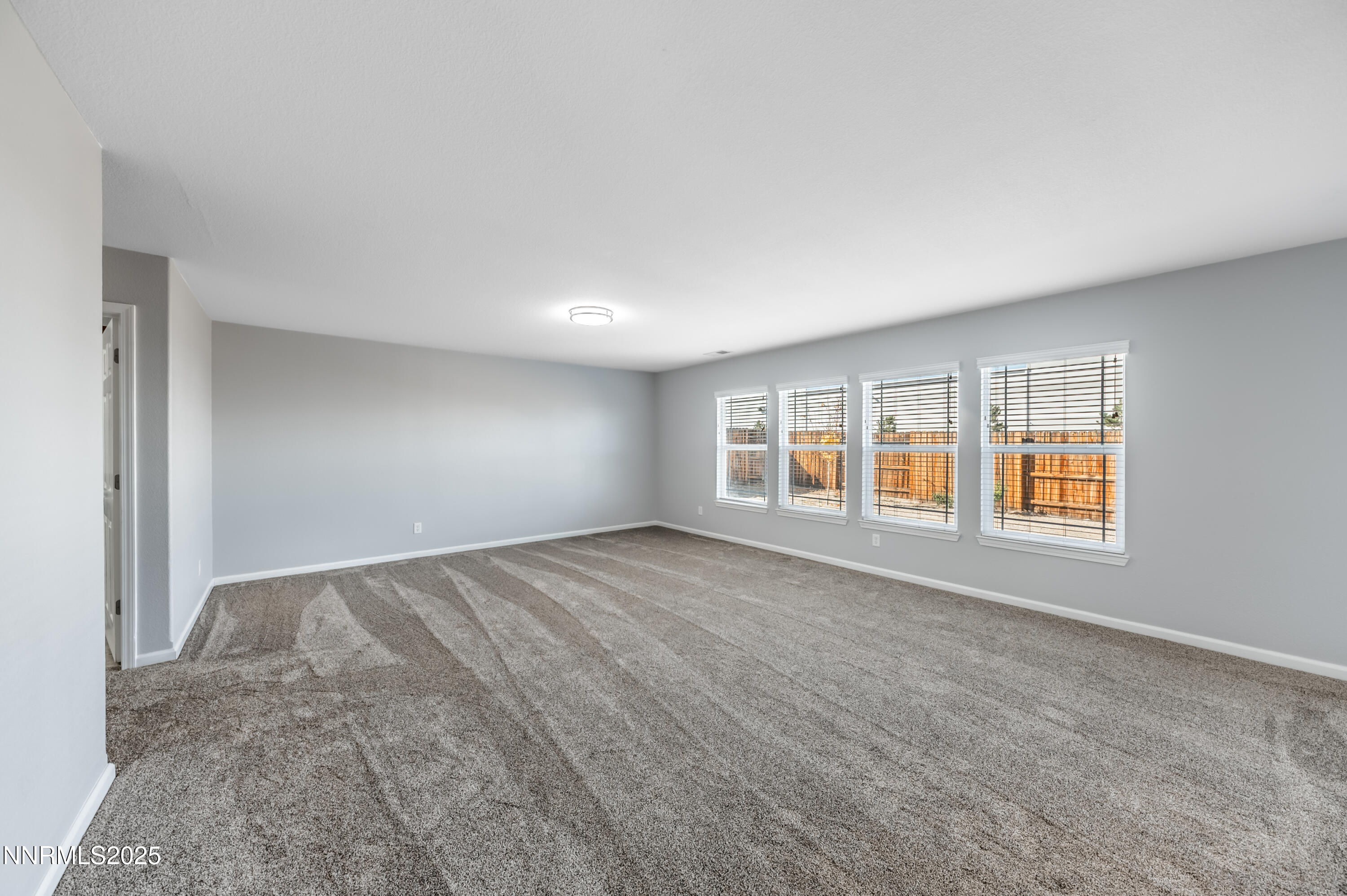 8905 Convair Way Reno, NV 89506 - Photo 17 of 38 a view of an empty room with a window