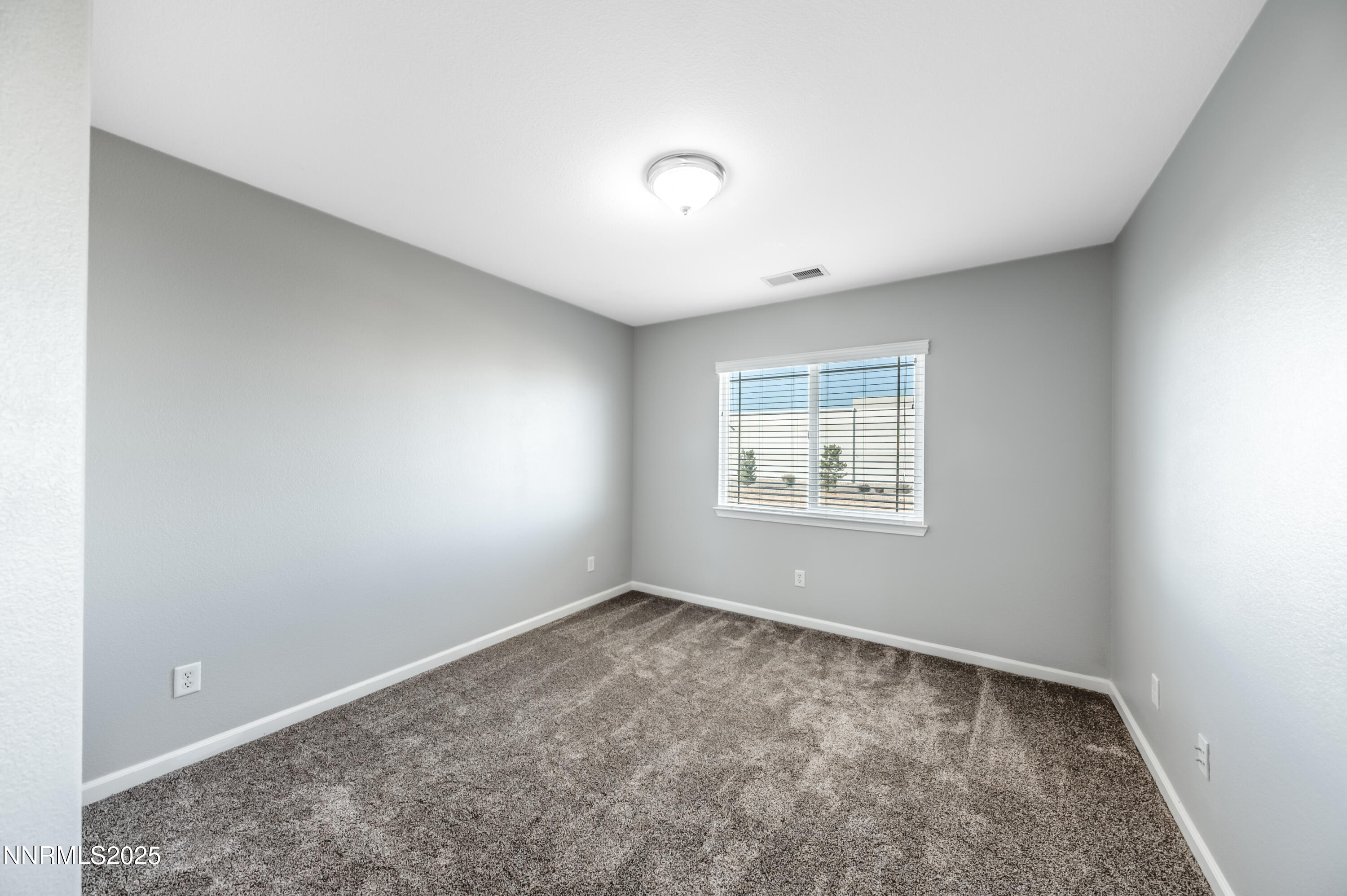 8905 Convair Way Reno, NV 89506 - Photo 27 of 38 an empty room with a window