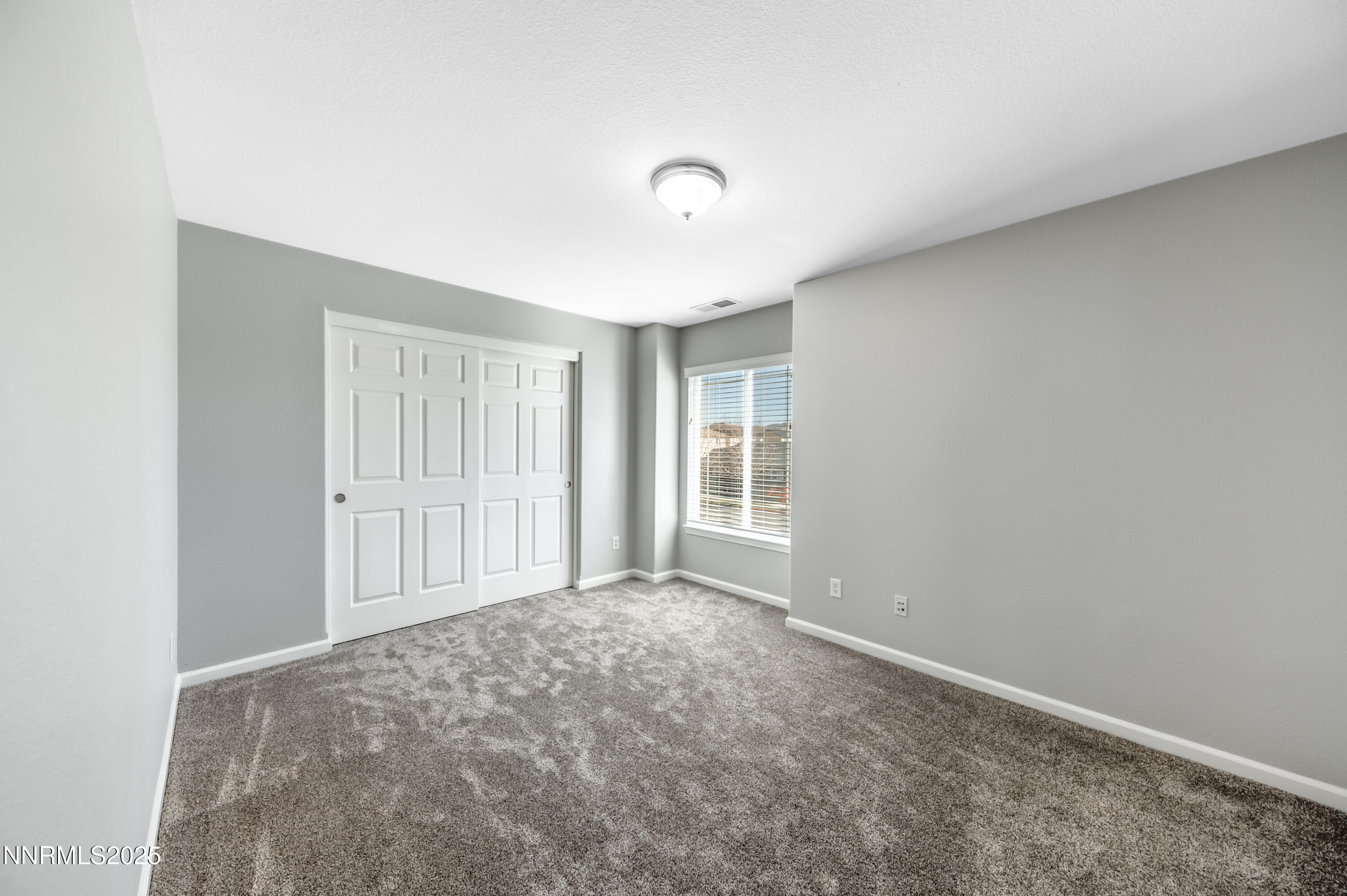 8905 Convair Way Reno, NV 89506 - Photo 28 of 38 an empty room with windows