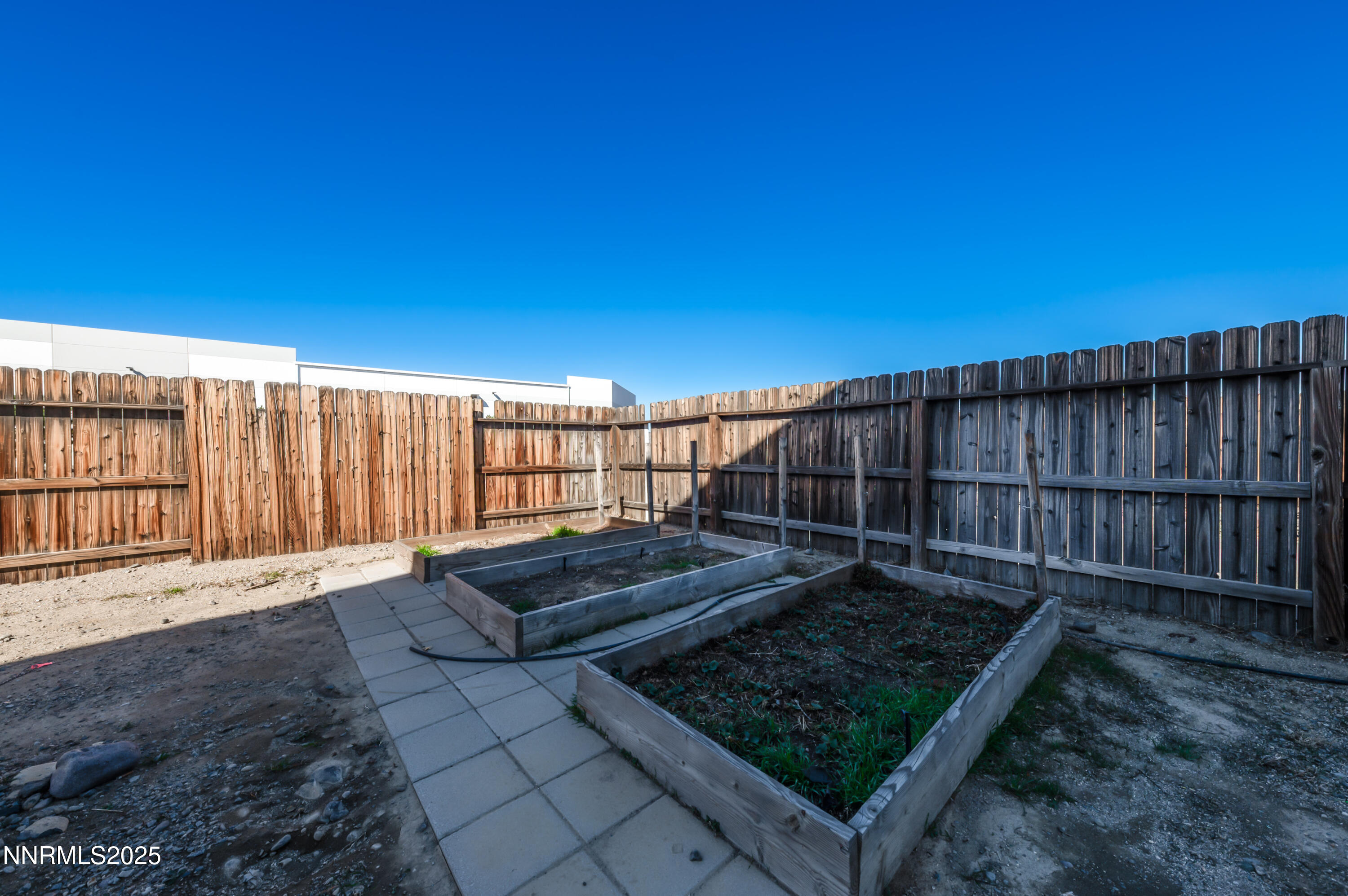 8905 Convair Way Reno, NV 89506 - Photo 33 of 38 a view of outdoor space with wooden fence