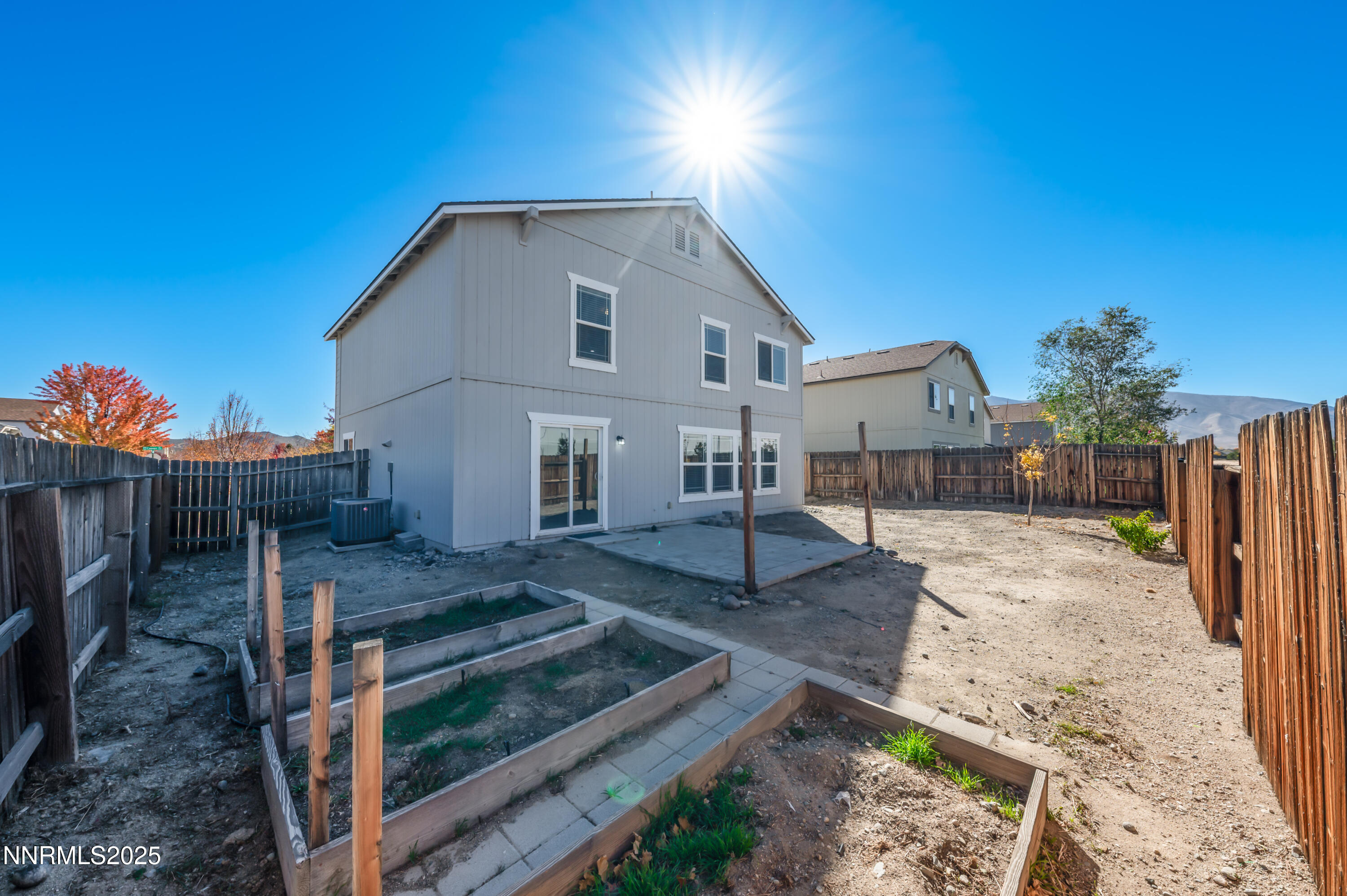 8905 Convair Way Reno, NV 89506 - Photo 35 of 38 a view of a house with backyard and sitting area