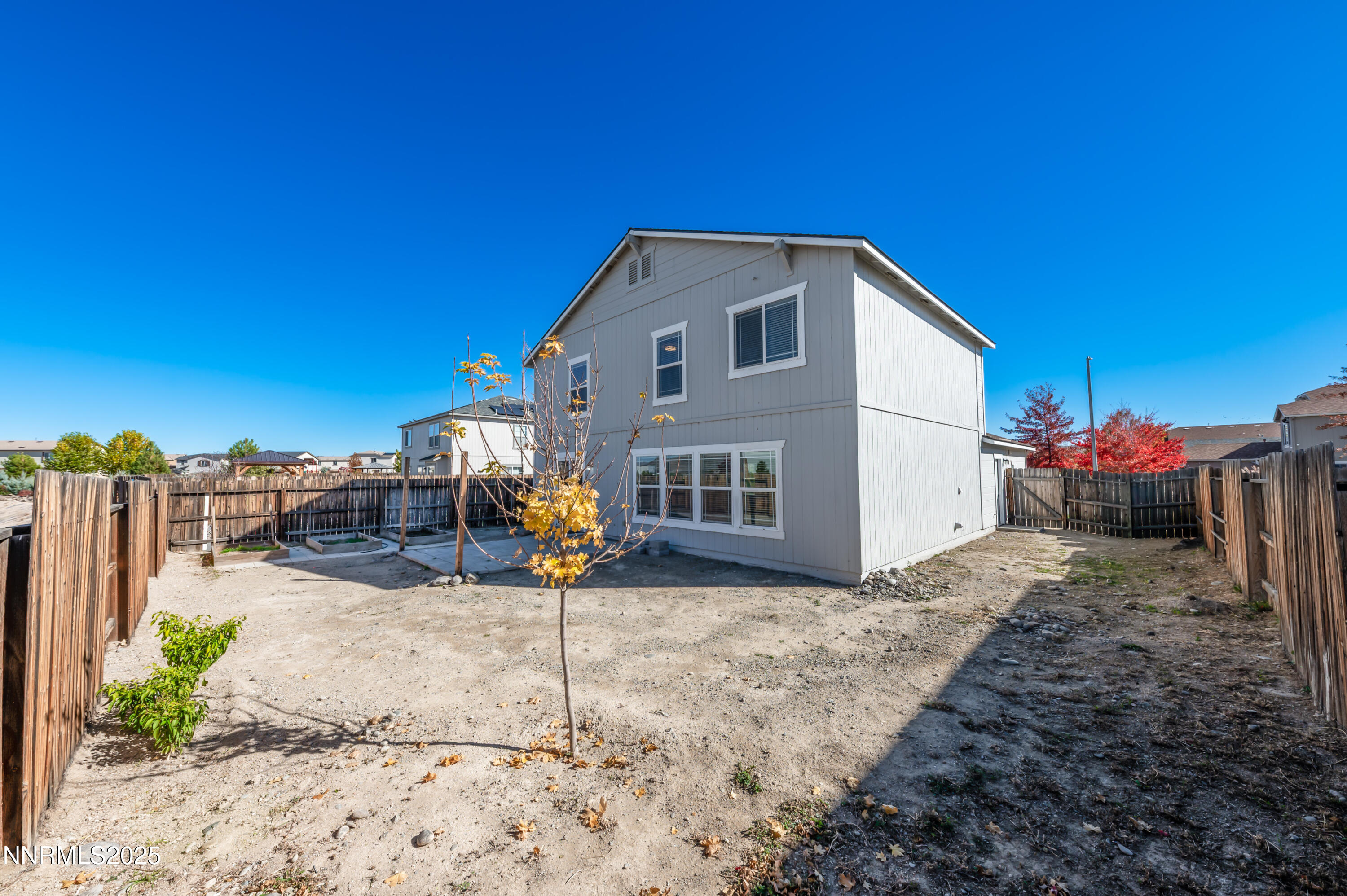 8905 Convair Way Reno, NV 89506 - Photo 36 of 38 a view of a house with a patio
