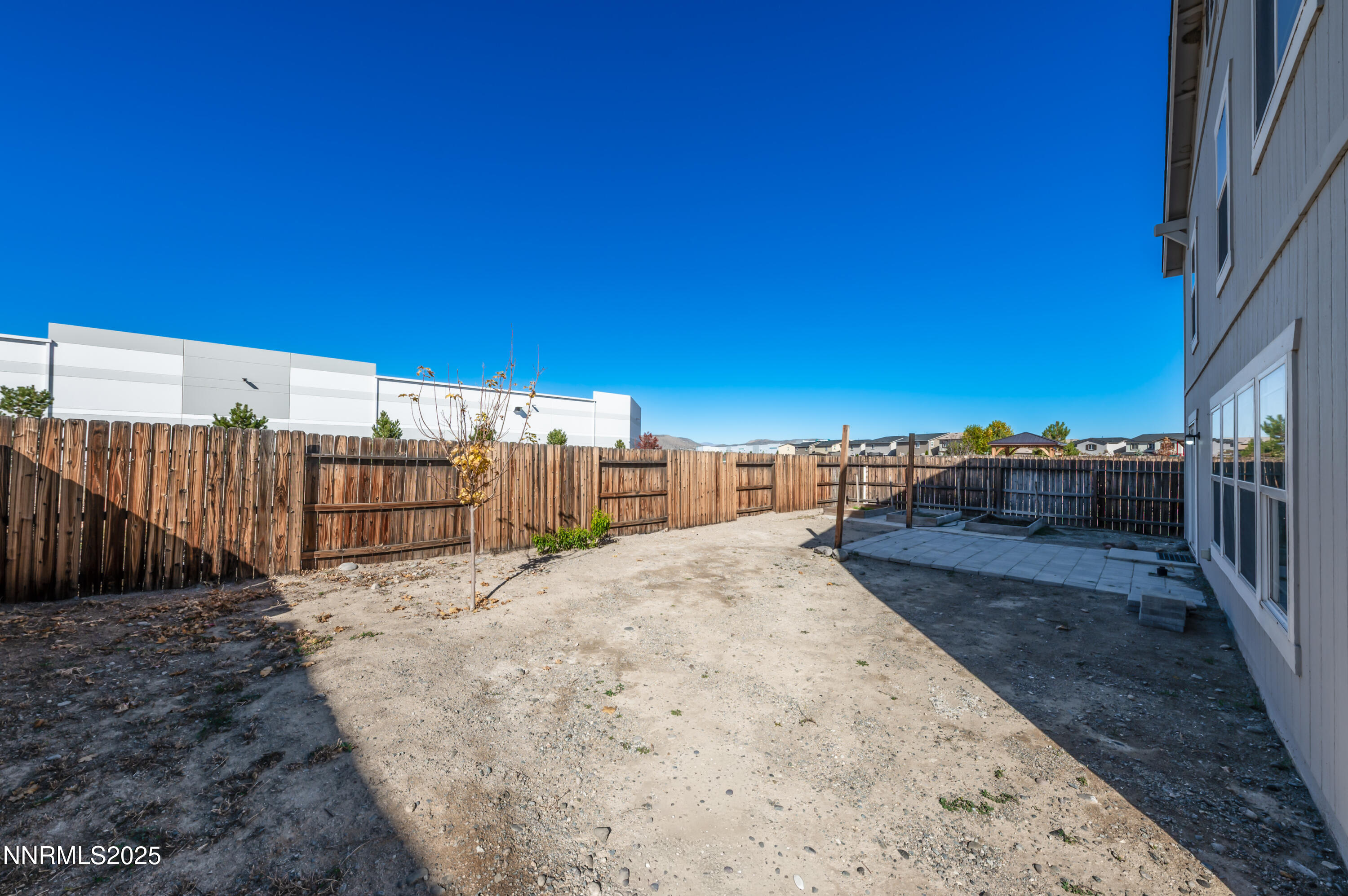 8905 Convair Way Reno, NV 89506 - Photo 38 of 38 a view of a backyard with wooden fence