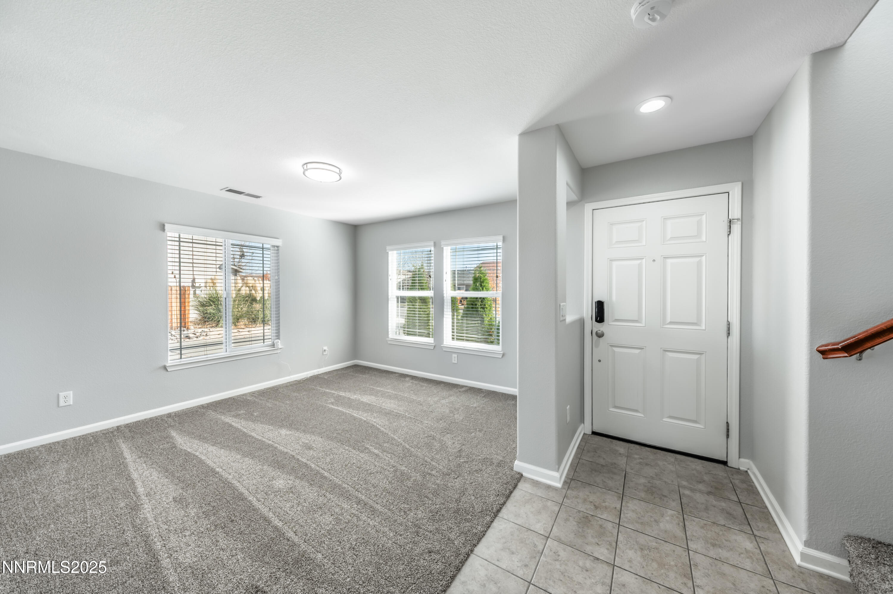 8905 Convair Way Reno, NV 89506 - Photo 8 of 38 a view of an empty room with a window
