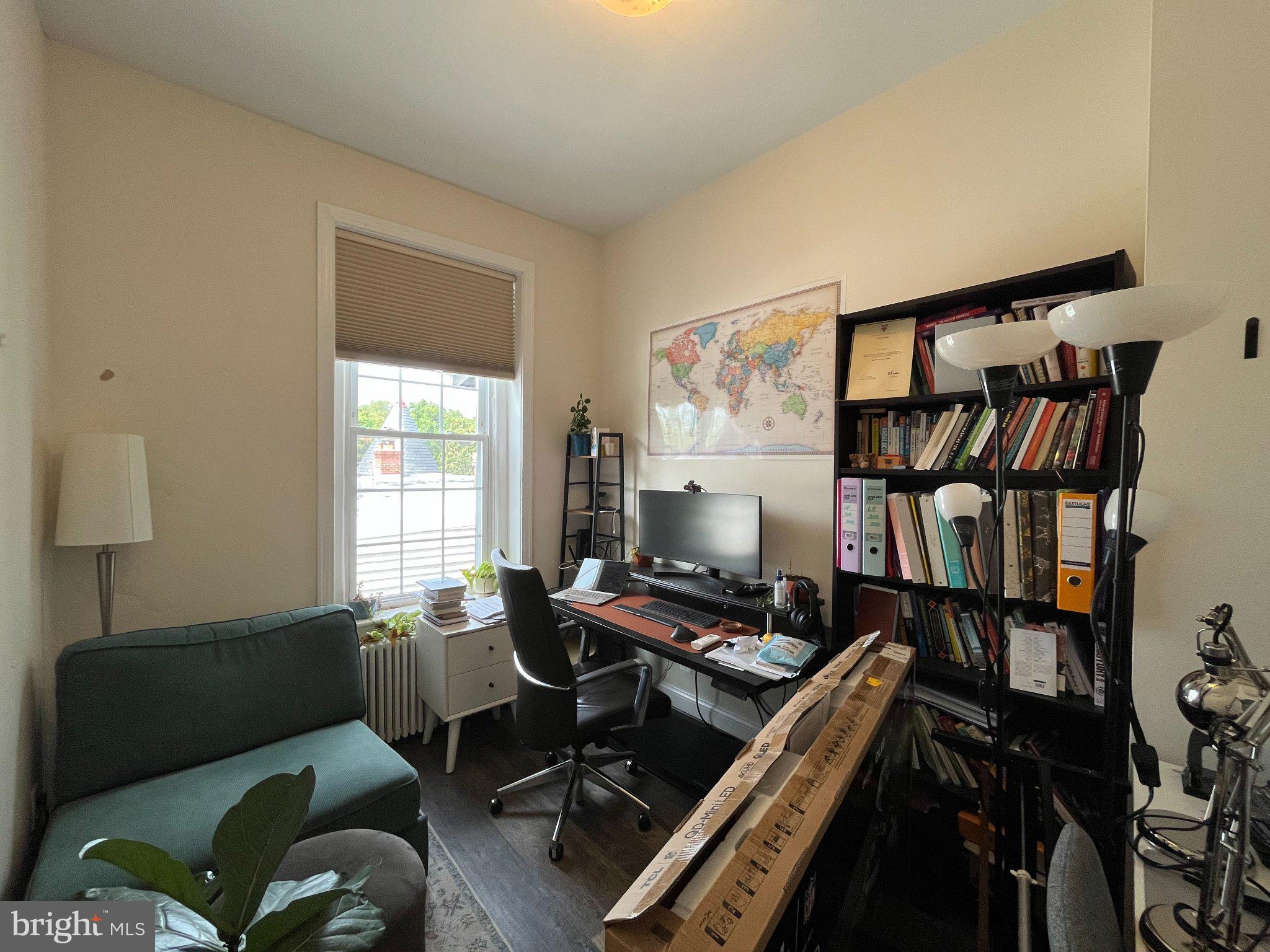 3003 P Street Northwest, Unit 400 Washington, DC 20007 - Photo 13 of 18 Cozy workspace with global inspiration.