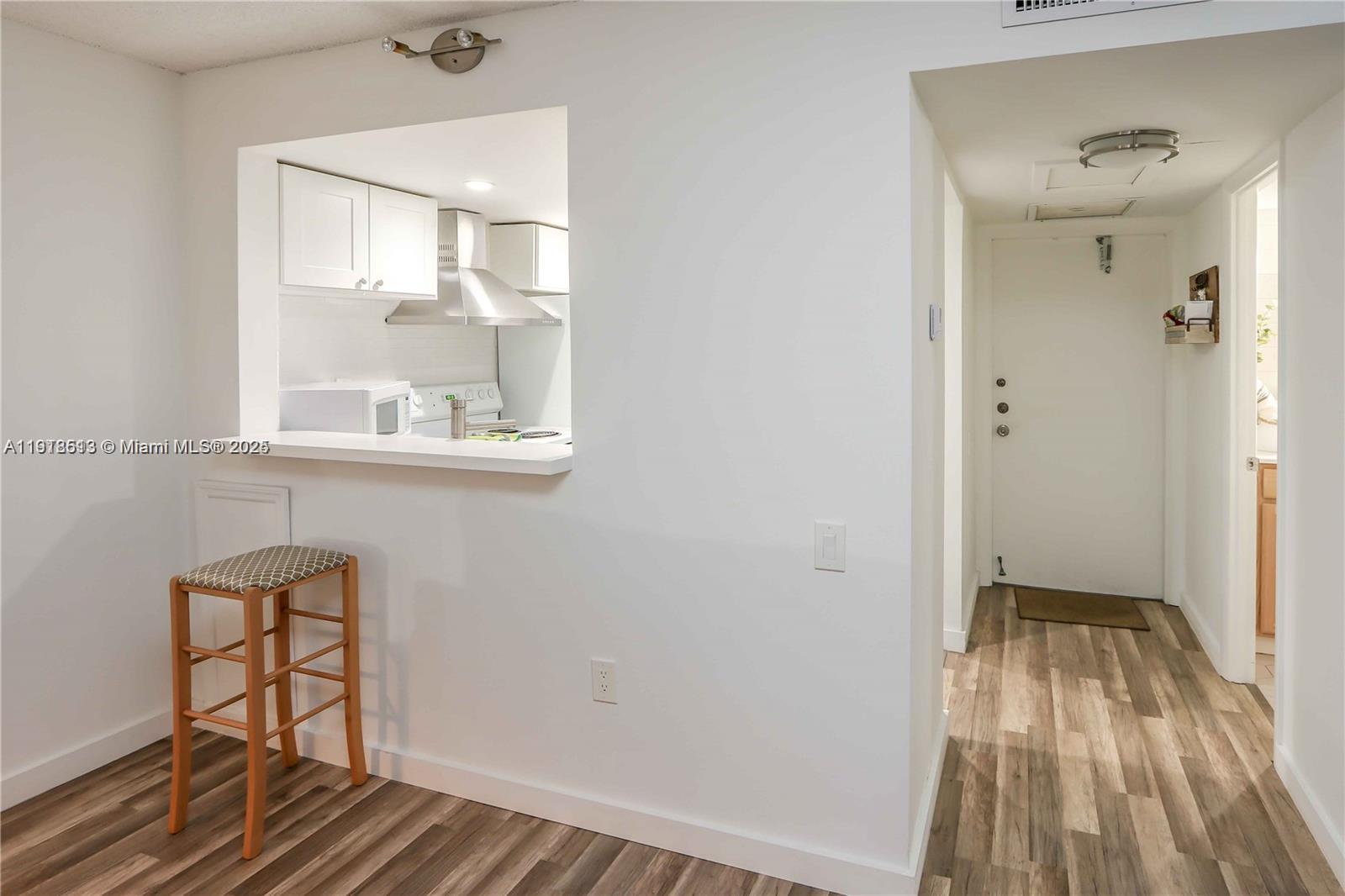 9150 Lime Bay Boulevard, Unit 212 Tamarac, FL 33321 - Photo 10 of 21 wooden floor in a gallery