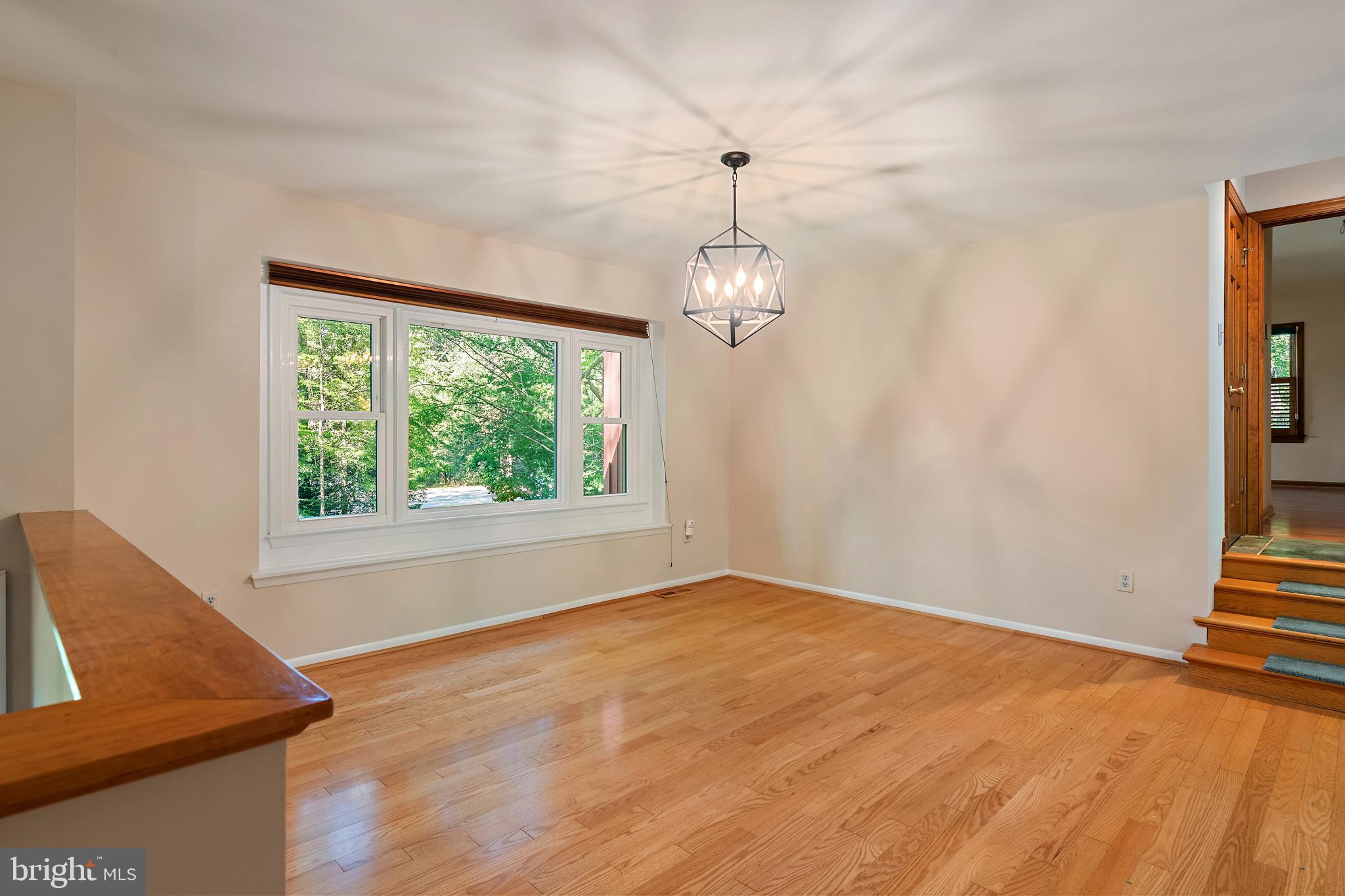 1701 Underwood Road Gambrills, MD 21054 - Photo 16 of 62 a view of an empty room with wooden floor and a window