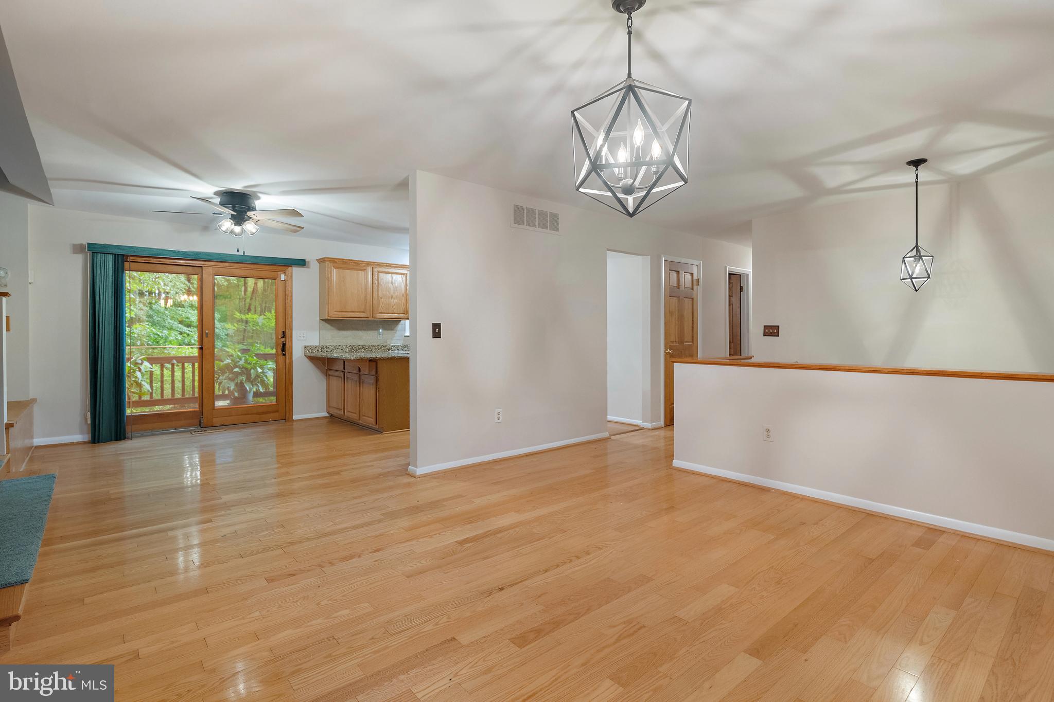 1701 Underwood Road Gambrills, MD 21054 - Photo 17 of 62 a view of an empty room with a window and kitchen view