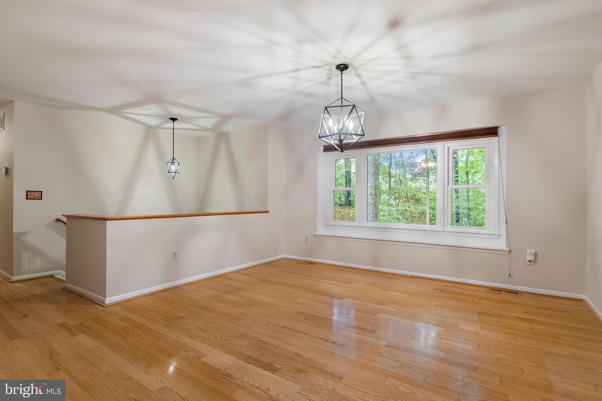 1701 Underwood Road Gambrills, MD 21054 - Photo 18 of 62 wooden floor in an empty room with a window