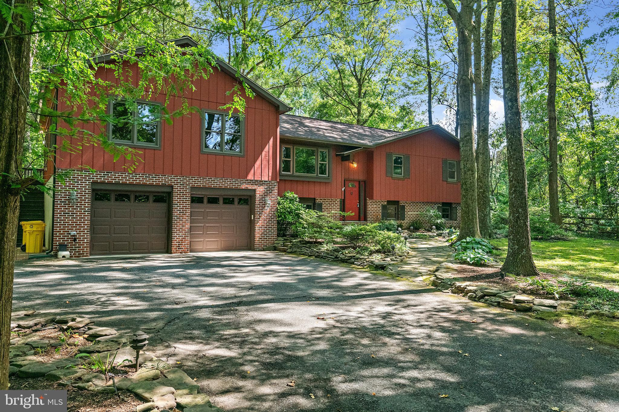 1701 Underwood Road Gambrills, MD 21054 - Photo 4 of 62 a view of a house with a tree in front of it