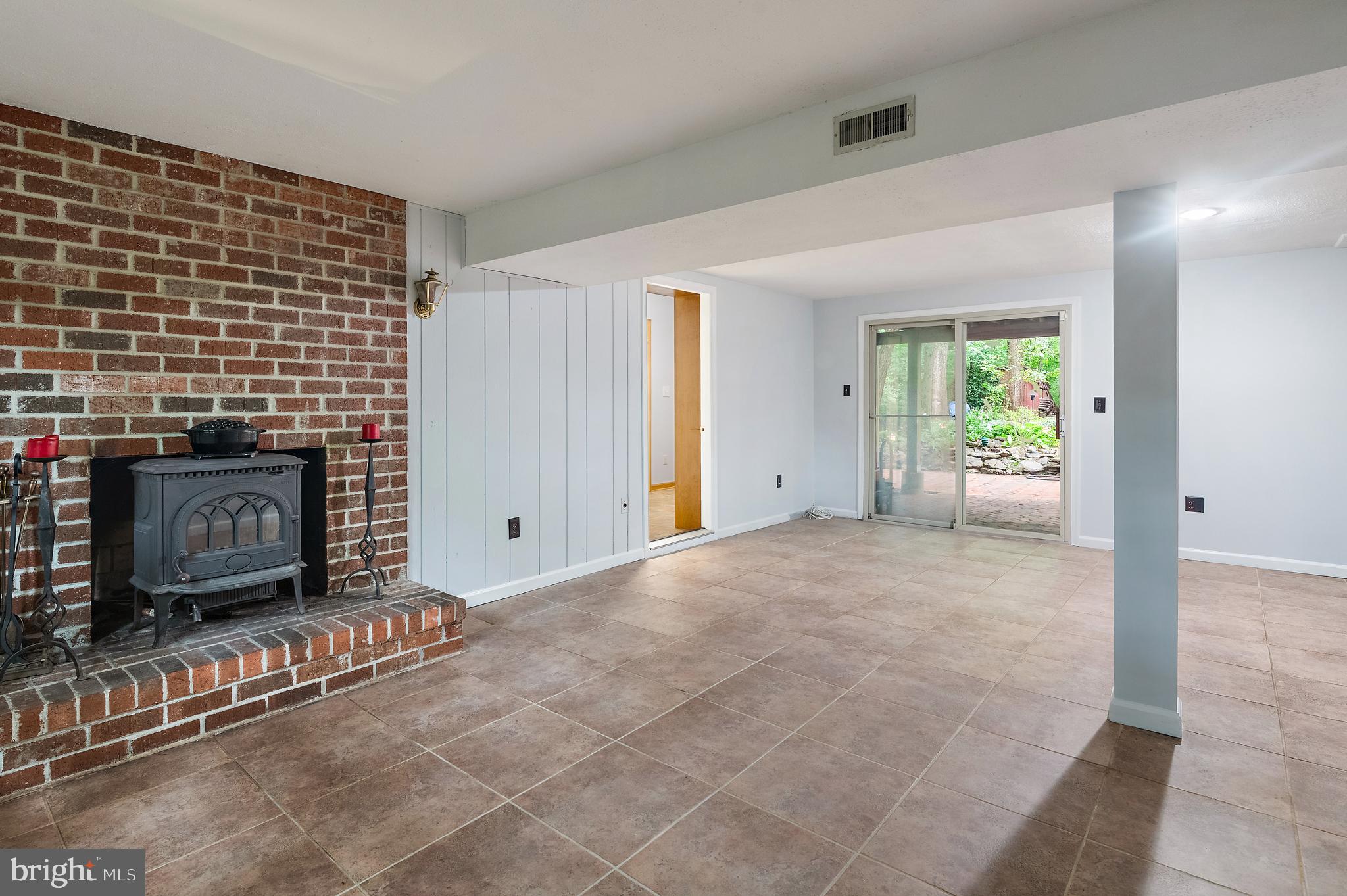1701 Underwood Road Gambrills, MD 21054 - Photo 49 of 62 a view of an empty room with window and fireplace