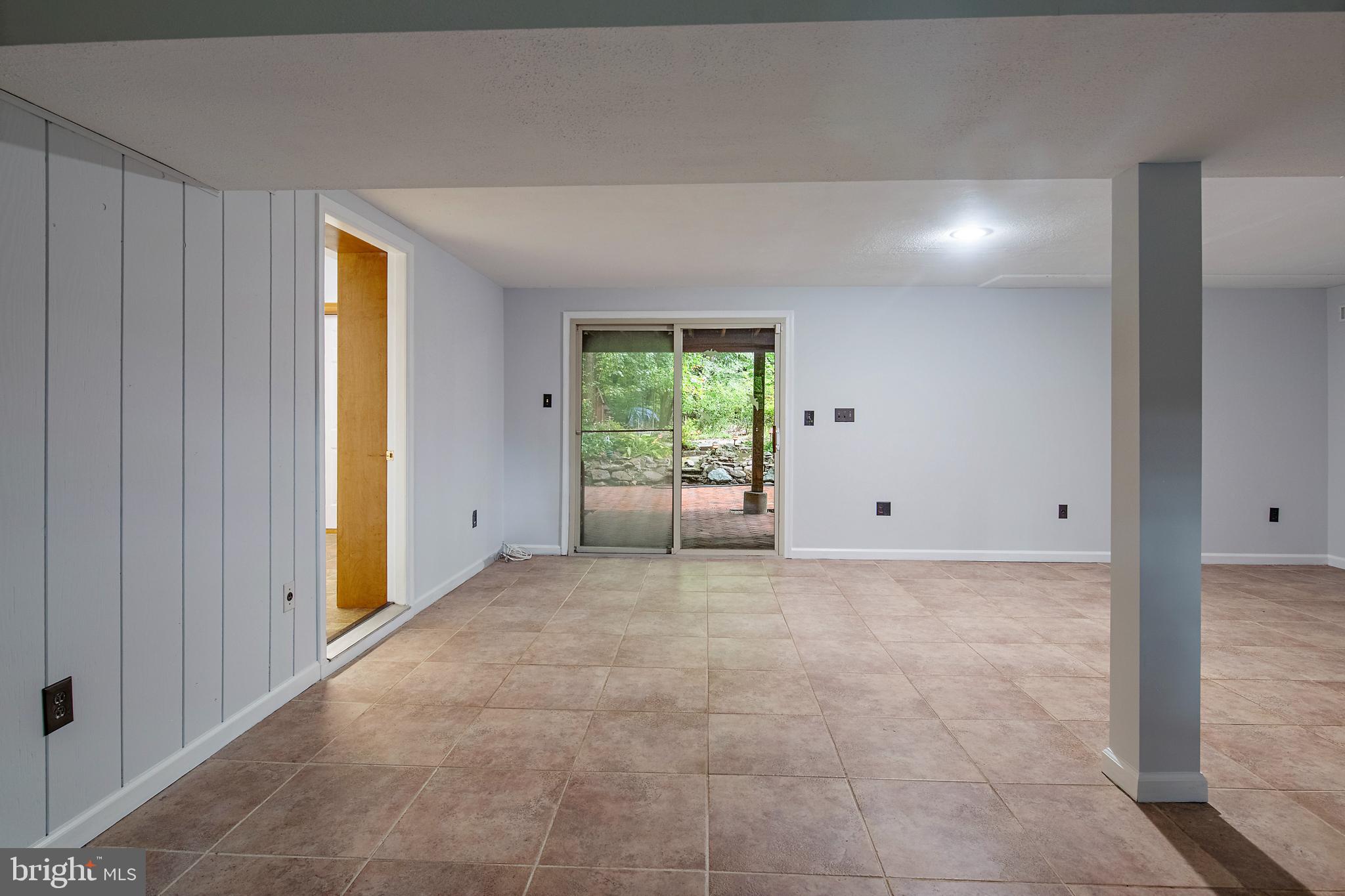 1701 Underwood Road Gambrills, MD 21054 - Photo 51 of 62 a view of a livingroom with an empty space and a window