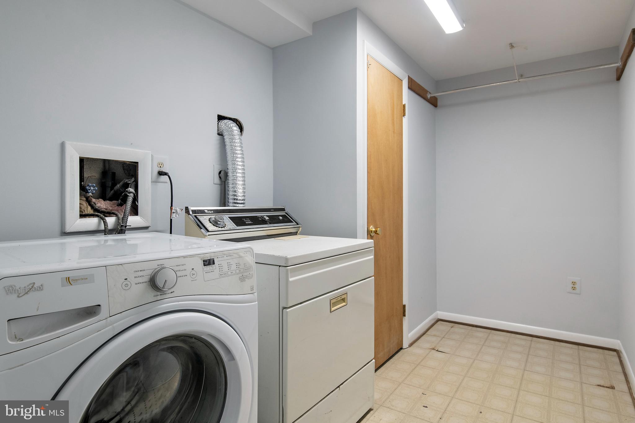 1701 Underwood Road Gambrills, MD 21054 - Photo 54 of 62 a utility room with dryer and washer