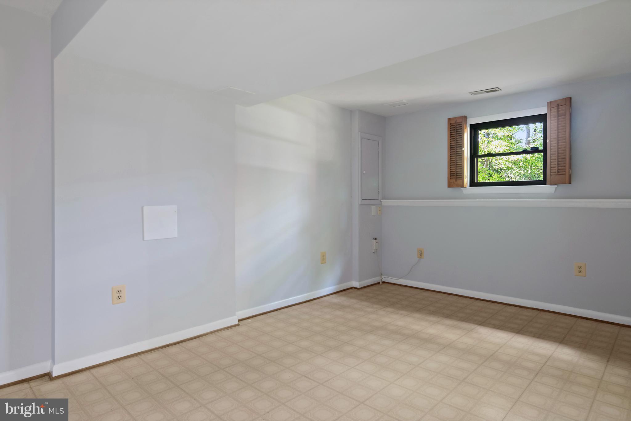 1701 Underwood Road Gambrills, MD 21054 - Photo 55 of 62 wooden floor in an empty room with a window