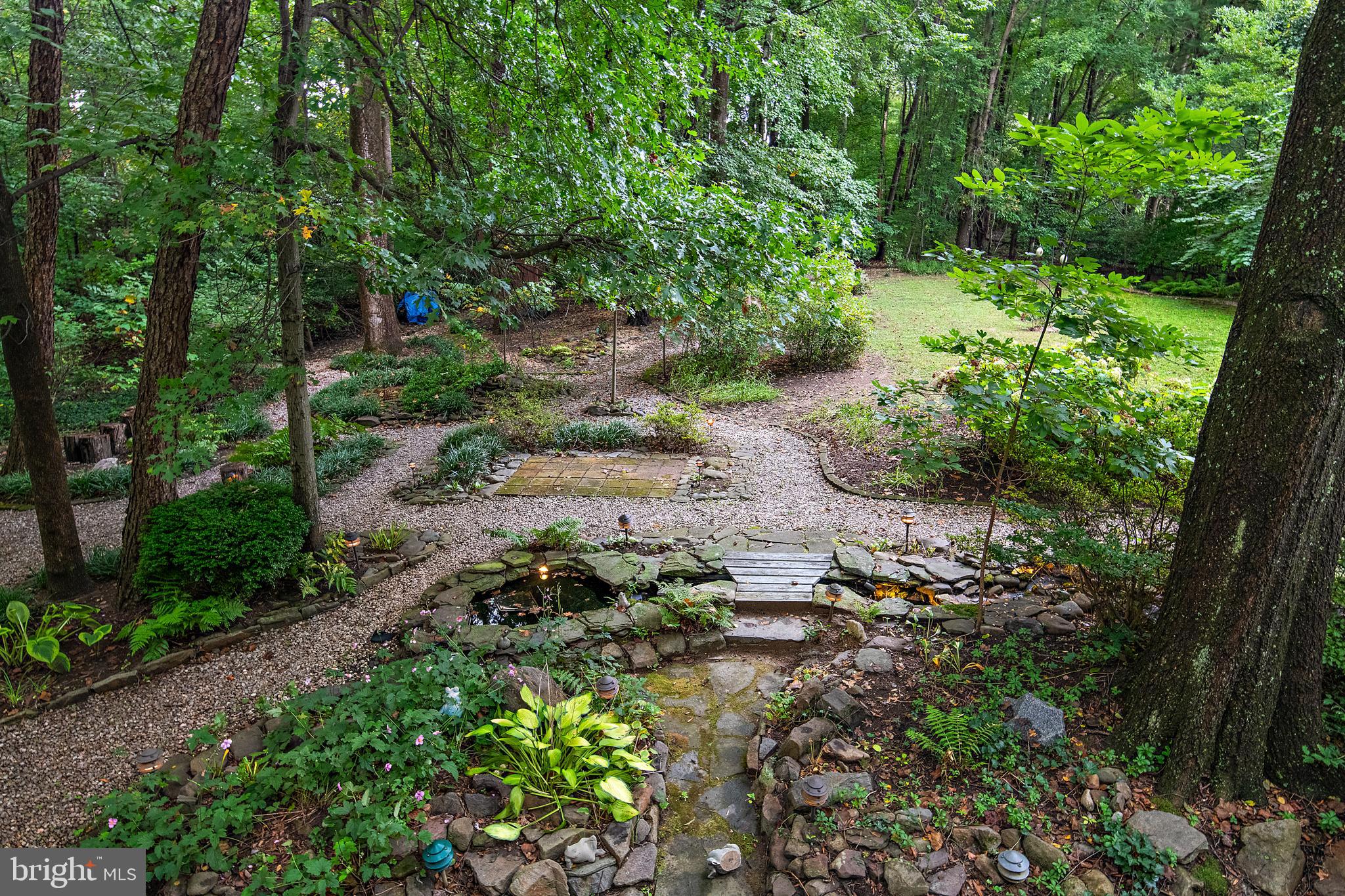 1701 Underwood Road Gambrills, MD 21054 - Photo 60 of 62 a view of a garden with trees
