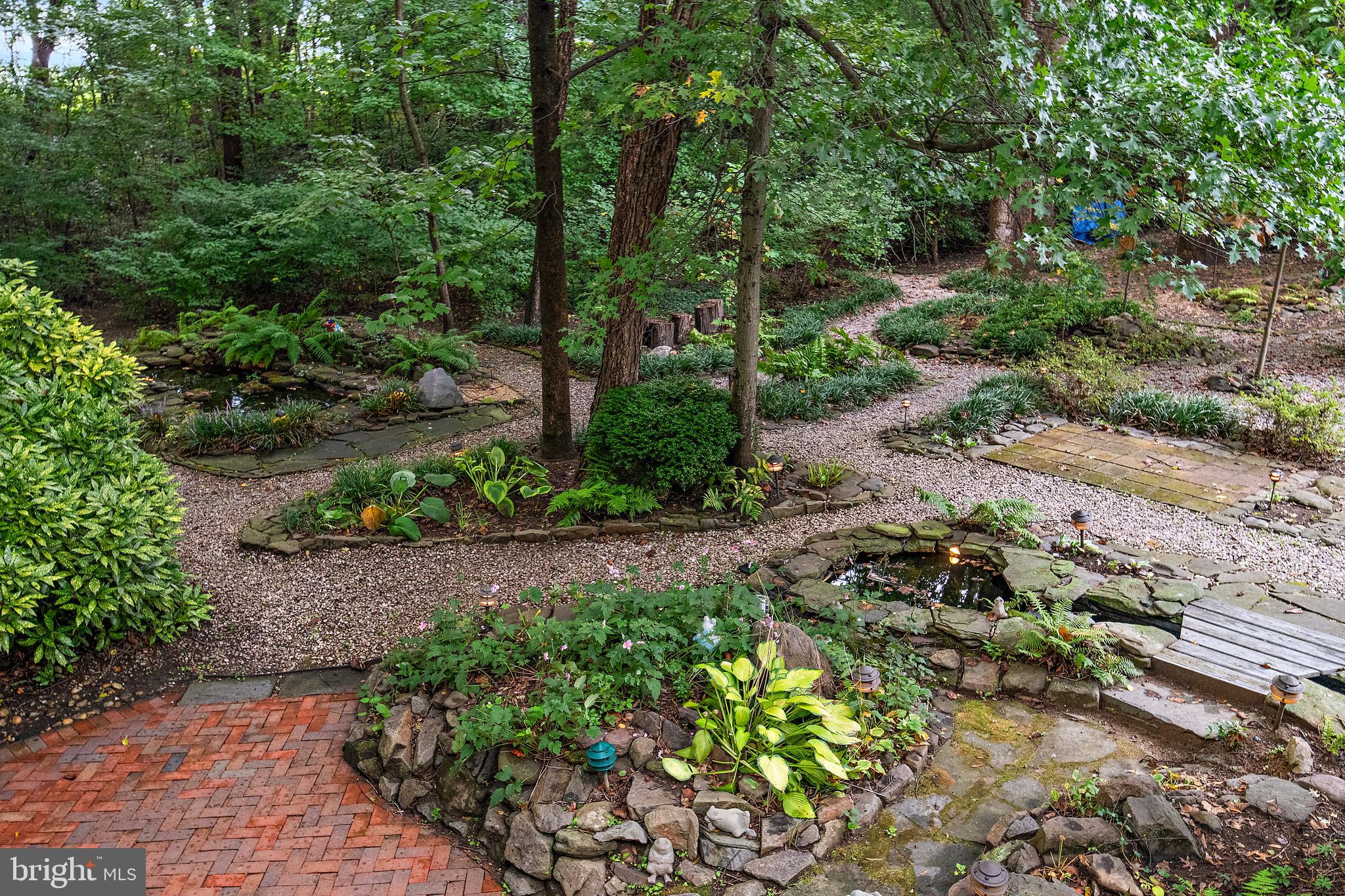 1701 Underwood Road Gambrills, MD 21054 - Photo 62 of 62 a view of a garden with plants and trees