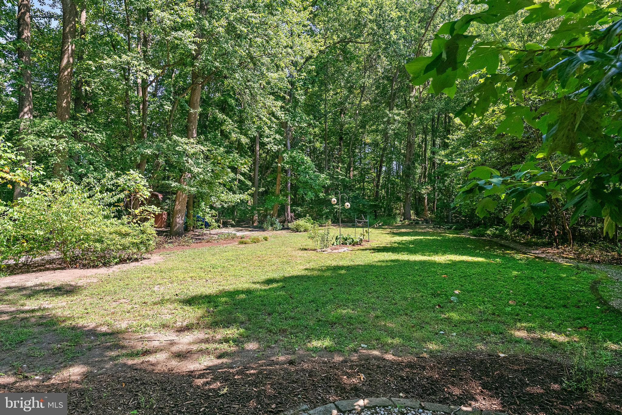 1701 Underwood Road Gambrills, MD 21054 - Photo 7 of 62 a view of green field with trees in the background