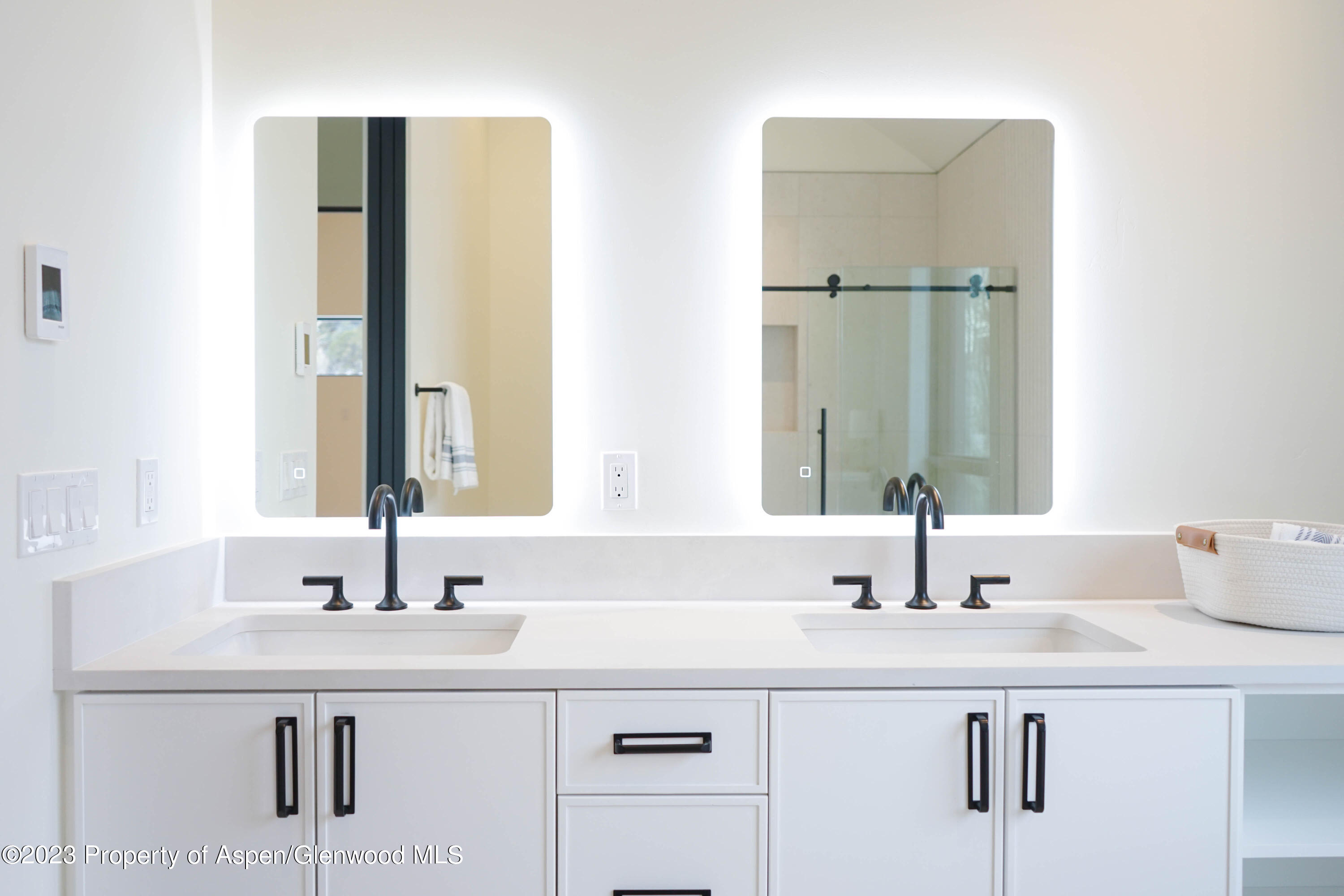415 Meadow Court Basalt, CO 81621 - Photo 11 of 19 a bathroom with a sink and a mirror
