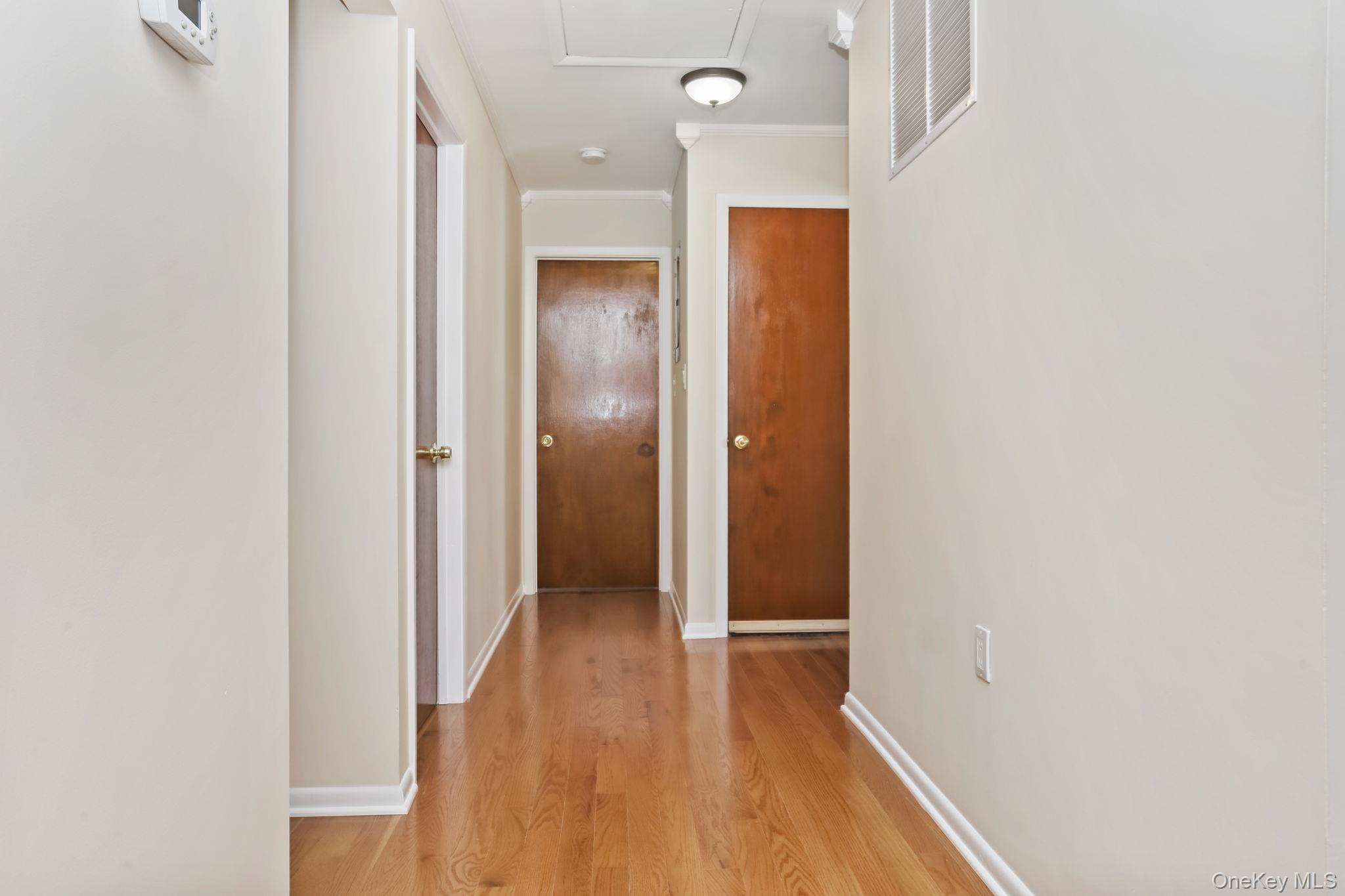 160 Lakeview Avenue, Unit 2 West Harrison, NY 10604 - Photo 11 of 19 a view of hallway with wooden floor