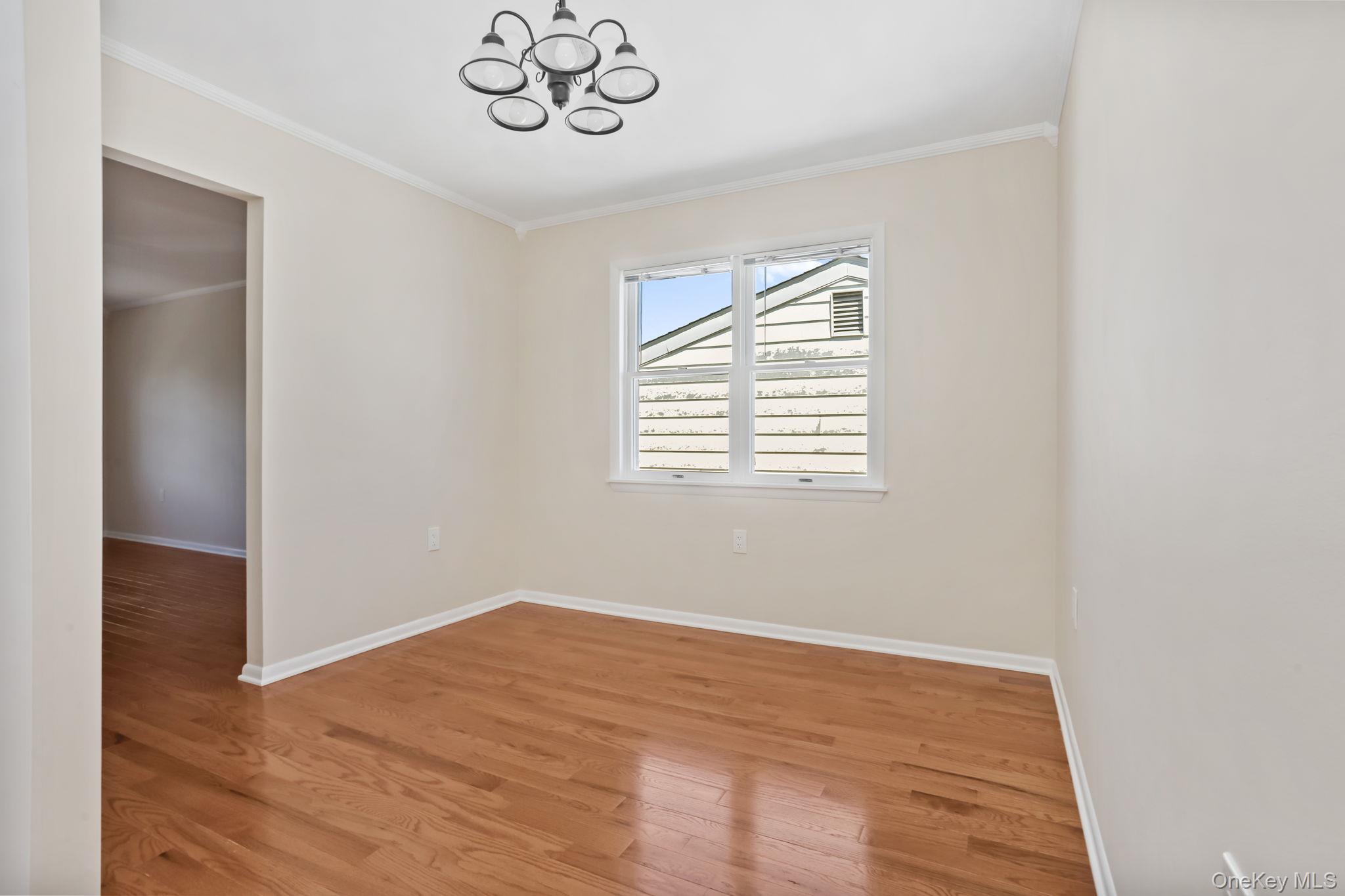 160 Lakeview Avenue, Unit 2 West Harrison, NY 10604 - Photo 6 of 19 an empty room with a window