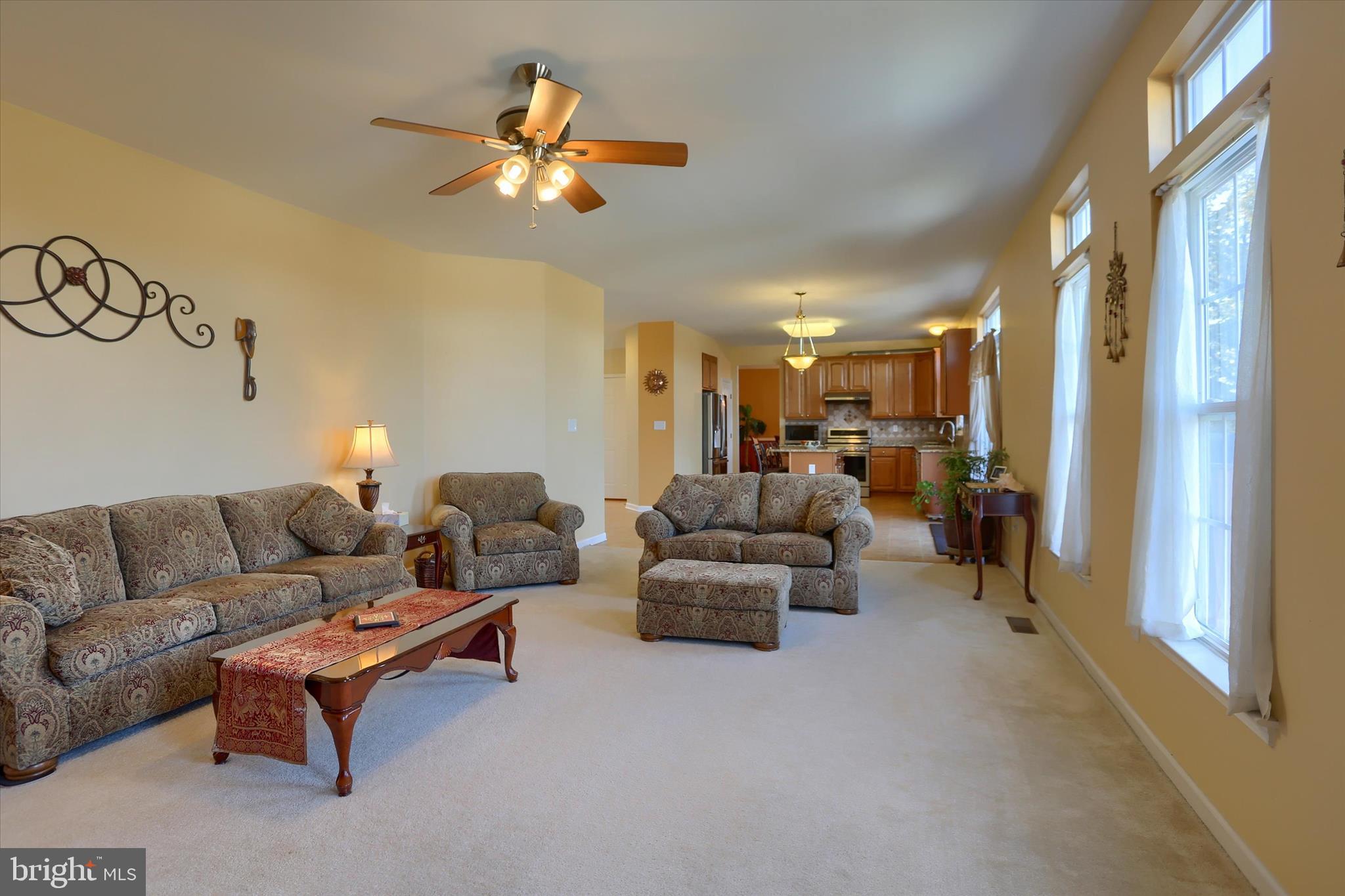 409 Wynwood Road York, PA 17402 - Photo 14 of 64 a living room with furniture and a chandelier