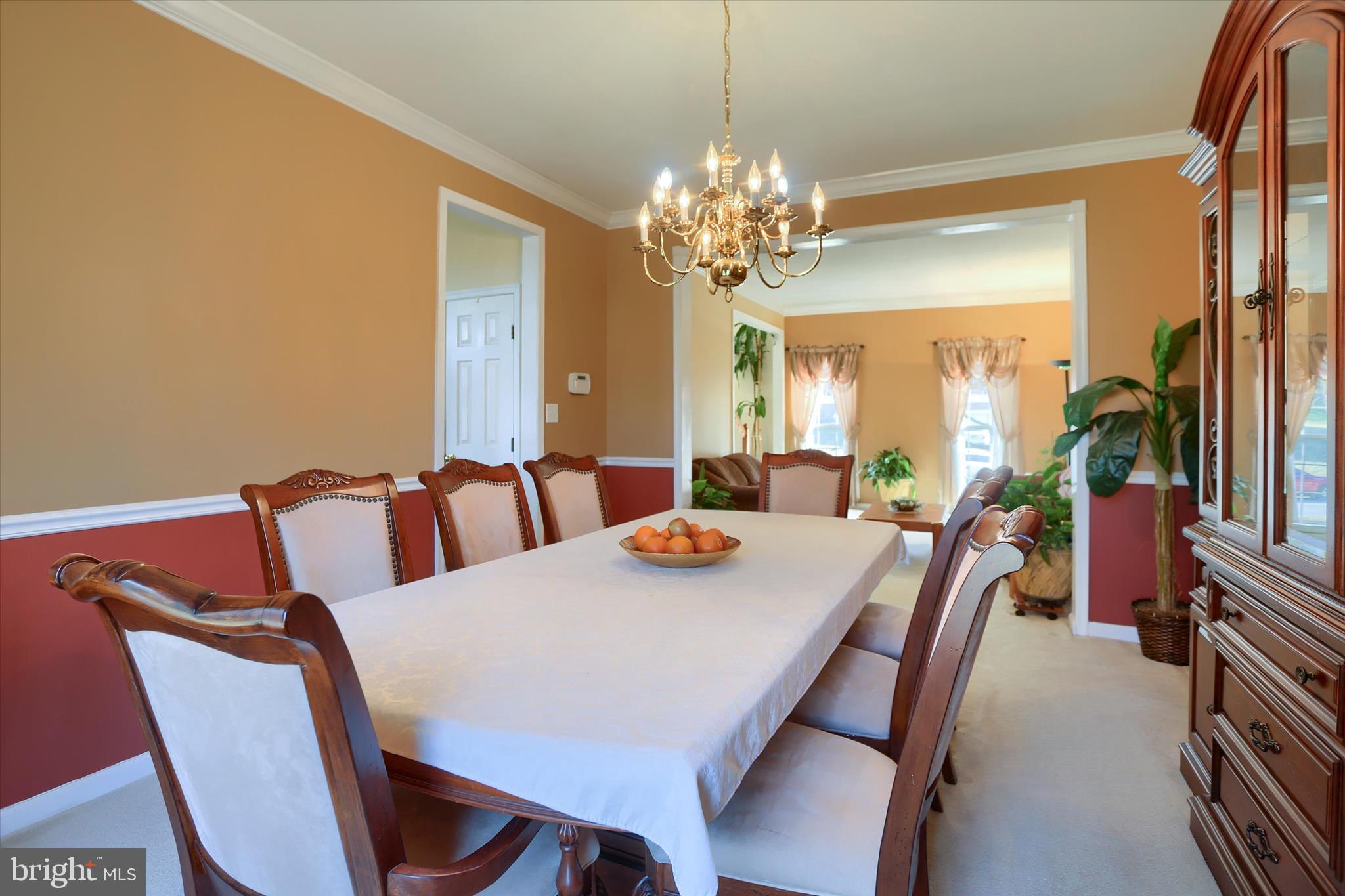 409 Wynwood Road York, PA 17402 - Photo 23 of 64 a view of a dining room with furniture and a chandelier