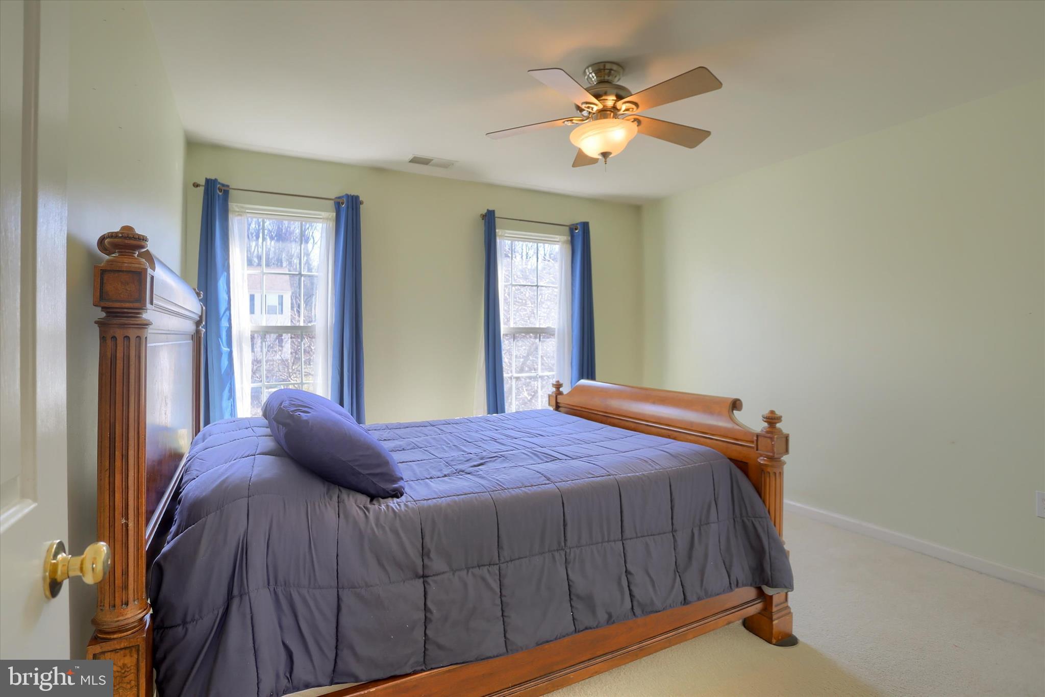 409 Wynwood Road York, PA 17402 - Photo 43 of 64 a bedroom with a bed and a chandelier