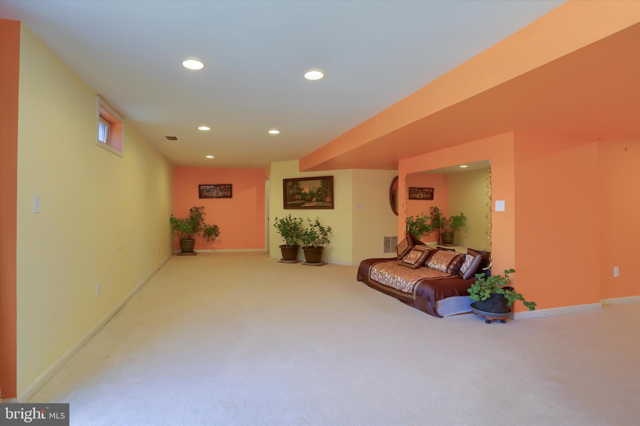 409 Wynwood Road York, PA 17402 - Photo 49 of 64 a big room with gym equipment and a large window