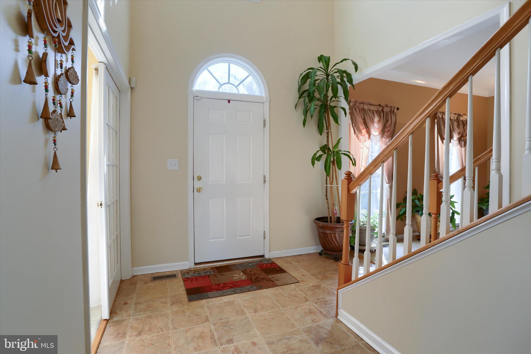 409 Wynwood Road York, PA 17402 - Photo 9 of 64 a view of entryway with a window and a potted plant