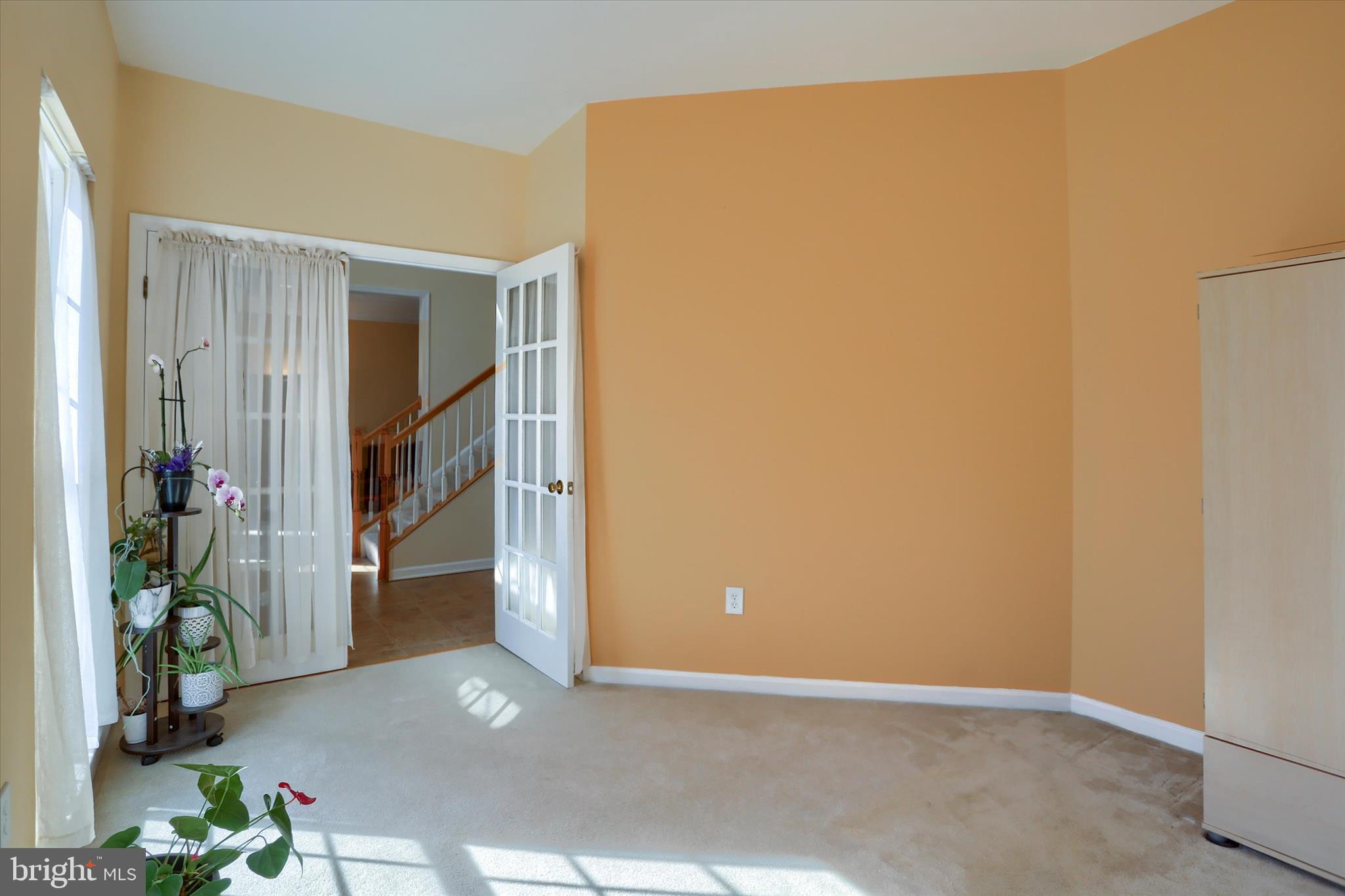 409 Wynwood Road York, PA 17402 - Photo 10 of 64 an empty room with potted plants