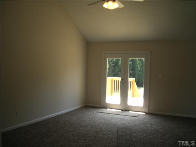 1334 Langdon Road Angier, NC 27501 - Photo 5 of 11 an empty room with a window