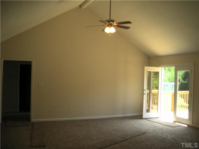 1334 Langdon Road Angier, NC 27501 - Photo 10 of 11 a view of an empty room with a window