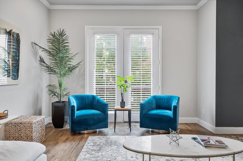 6013 Page Street Frisco, TX 75034 - Photo 21 of 39 a living room with furniture and a potted plant