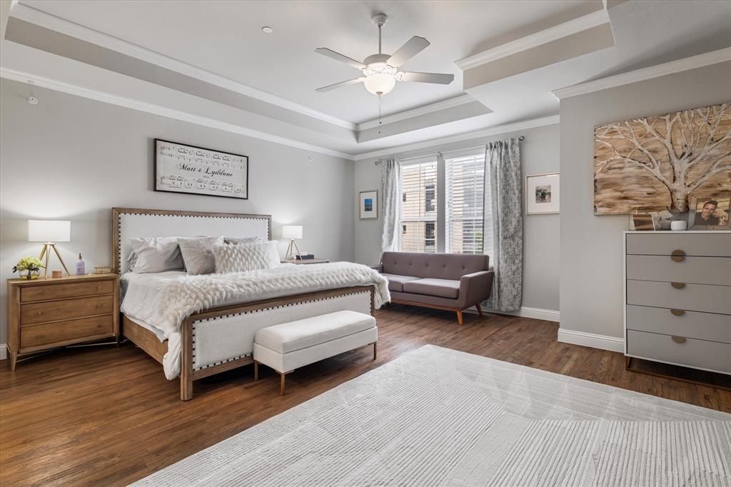 6013 Page Street Frisco, TX 75034 - Photo 26 of 39 a spacious bedroom with a bed and a couch